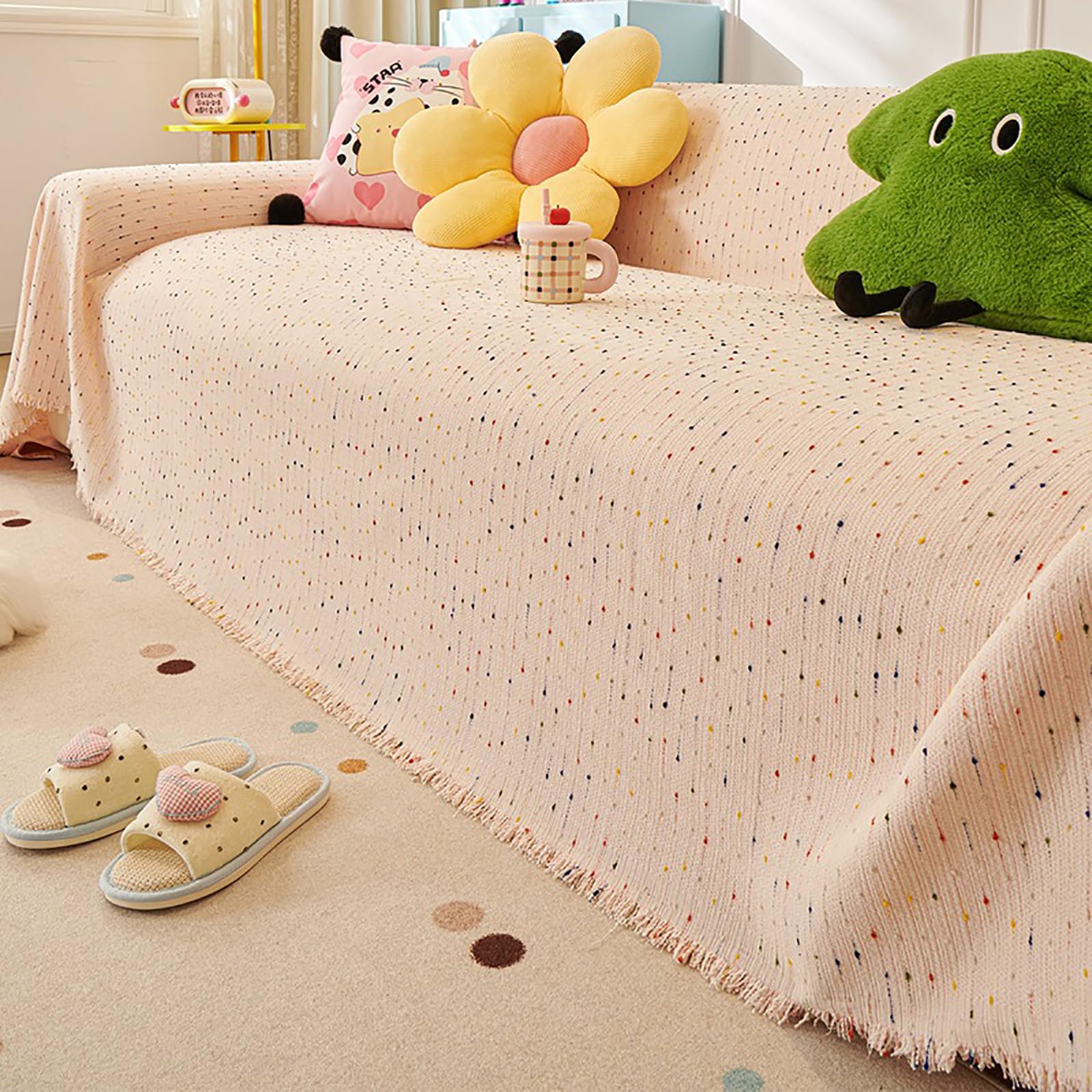 Housse de canapé douce vert multicolore pour créer un salon cosy et serein
