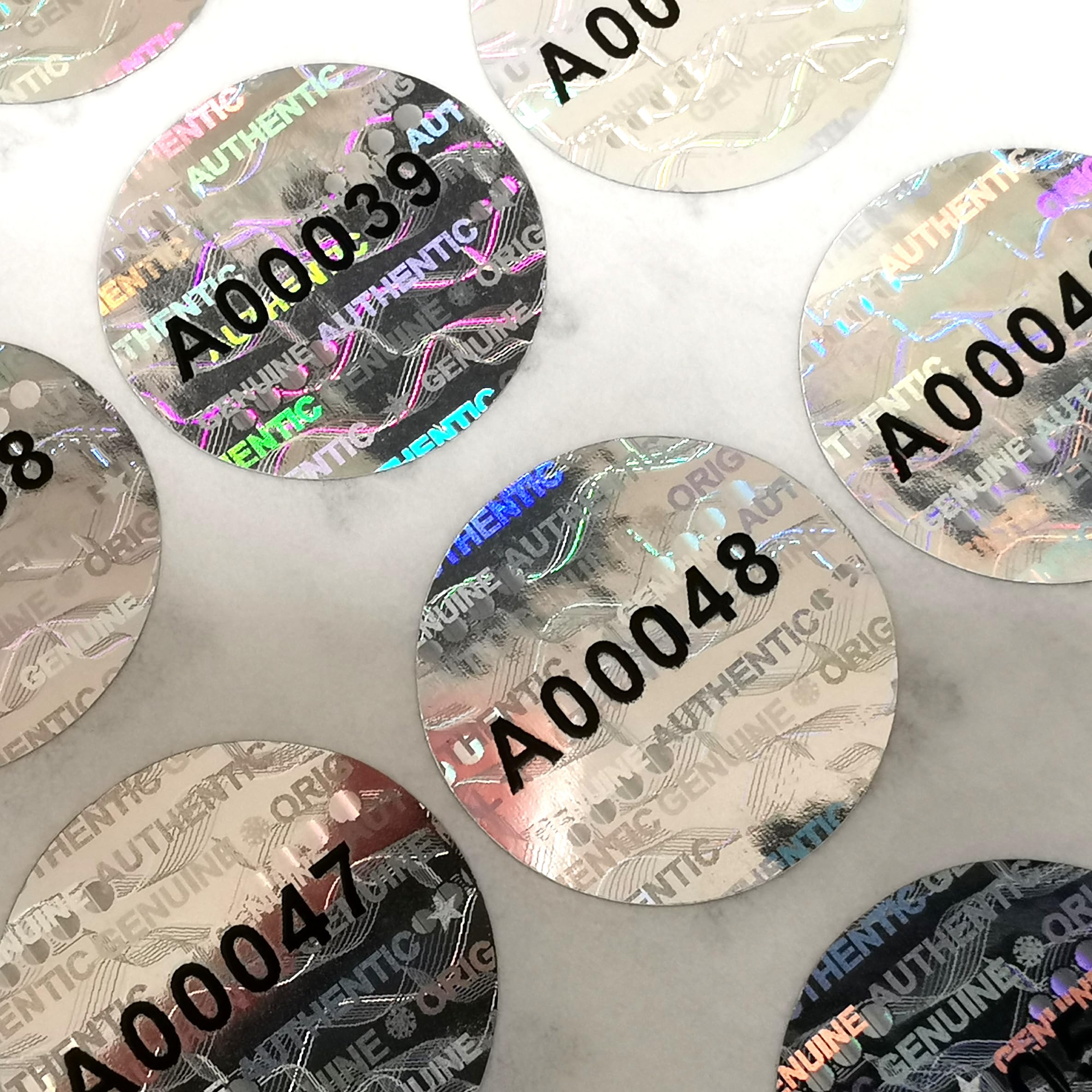 SIGILLI ADESIVI OLOGRAMMI ANTIMANOMISSIONE NEUTRI | Mondo Etichette