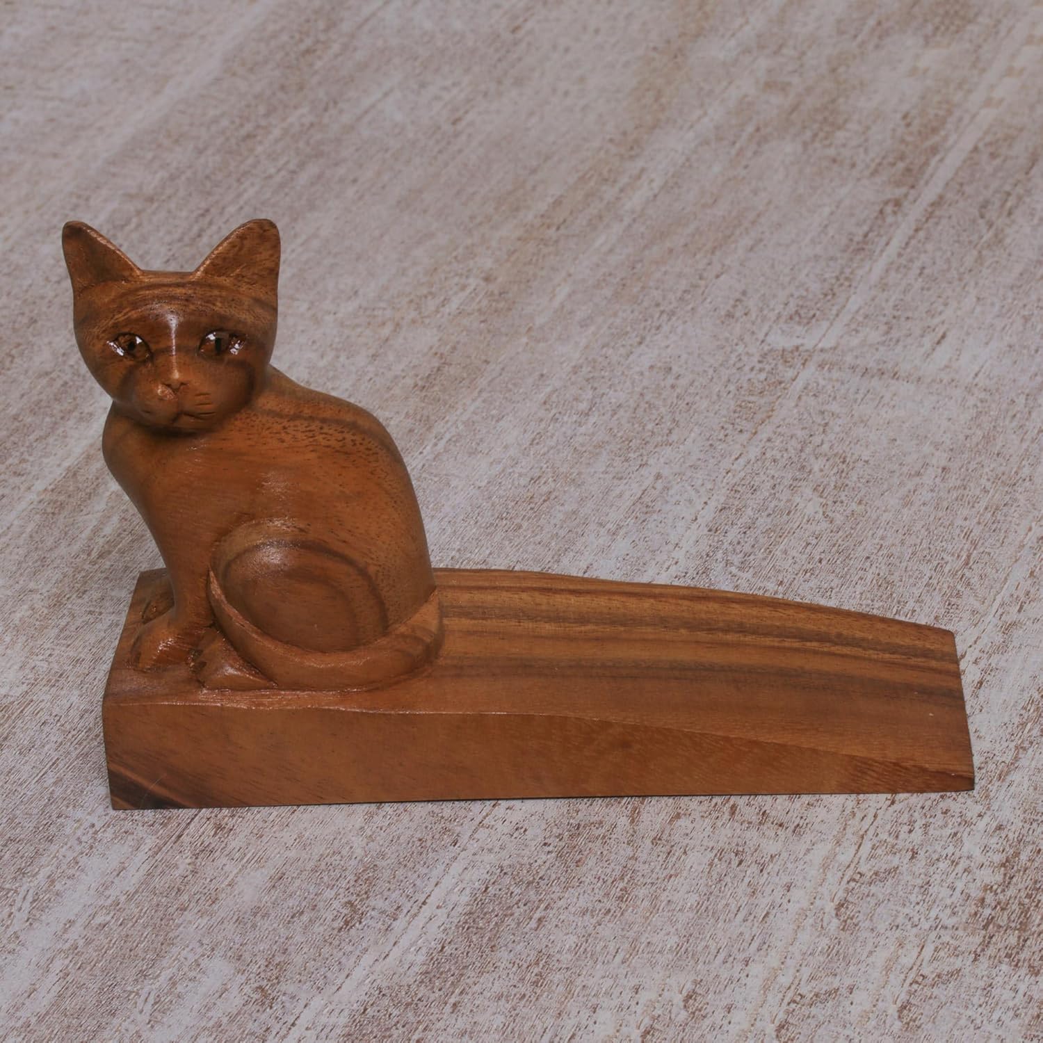 NOVICA Artisan Handcrafted Wood Doorstop Suar Cat in Brown from Bali Indonesia Decor Accessories Home Accents Animal Themed [2.2in H x 6.25in W x 2.4in D] ' Helpful Kitten in Brown'