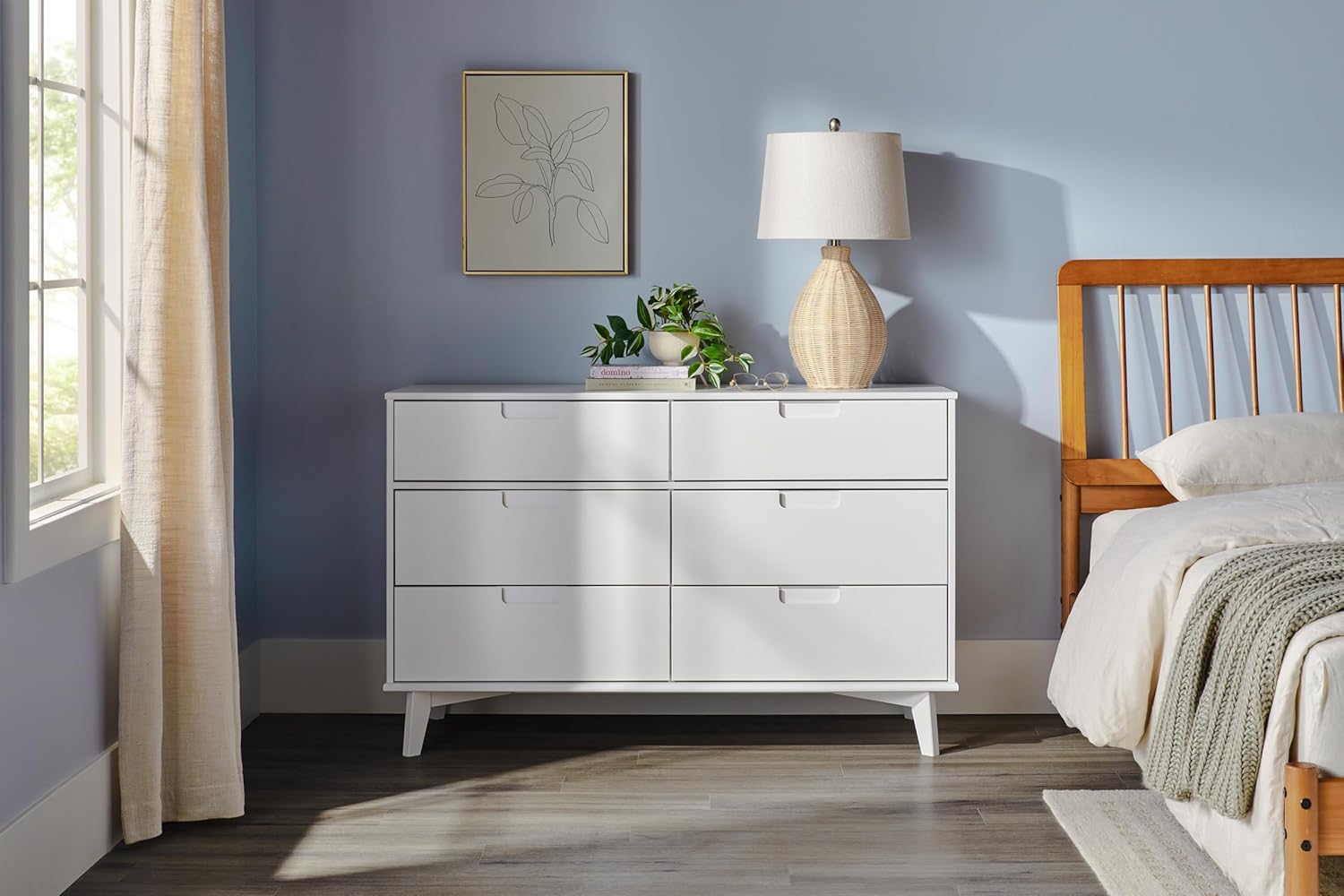 White dresser in a bedroom setting