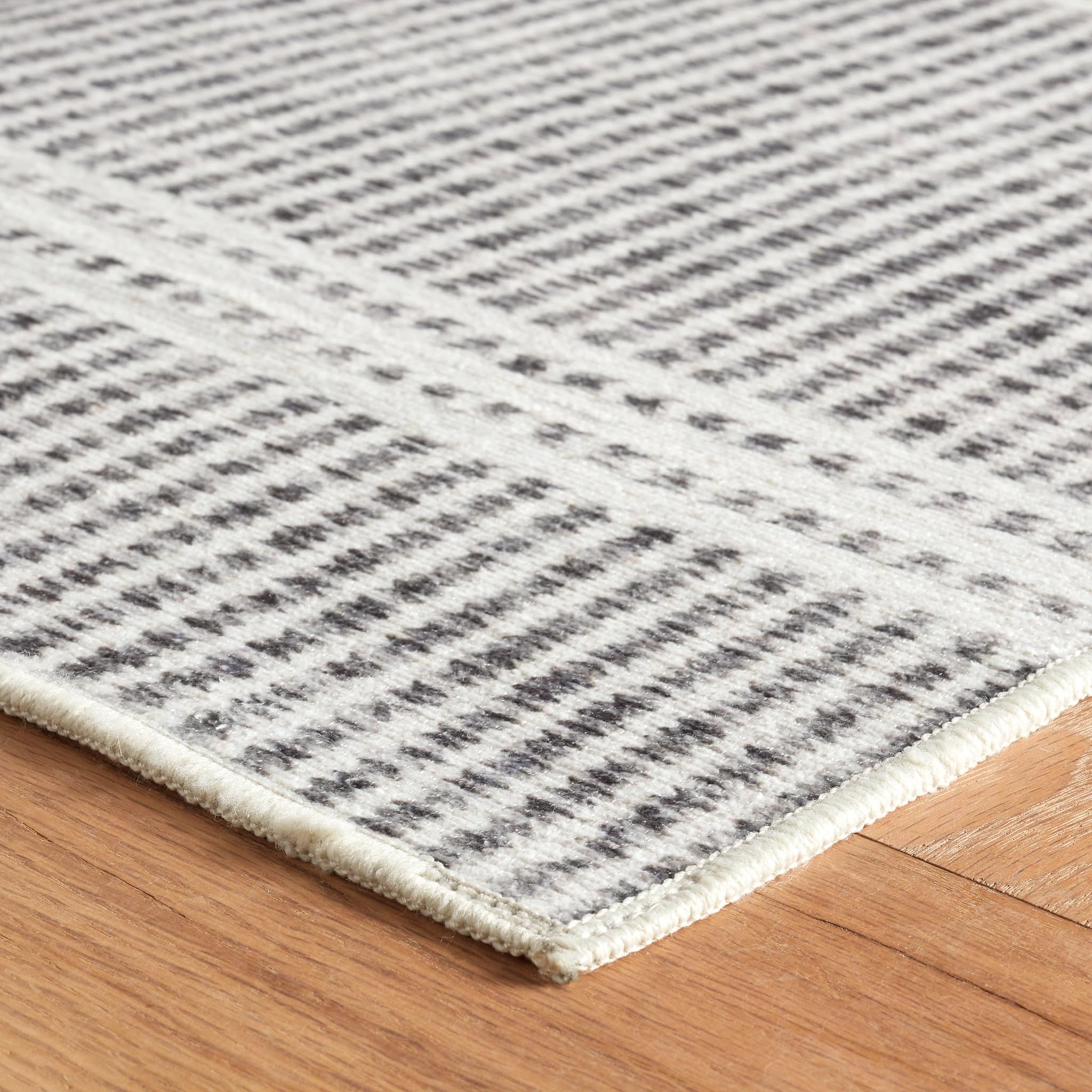 Condition photo showing New/Like New for dash & albert malta grey machine washable rug, 2 x 3 feet, grey stripe pattern