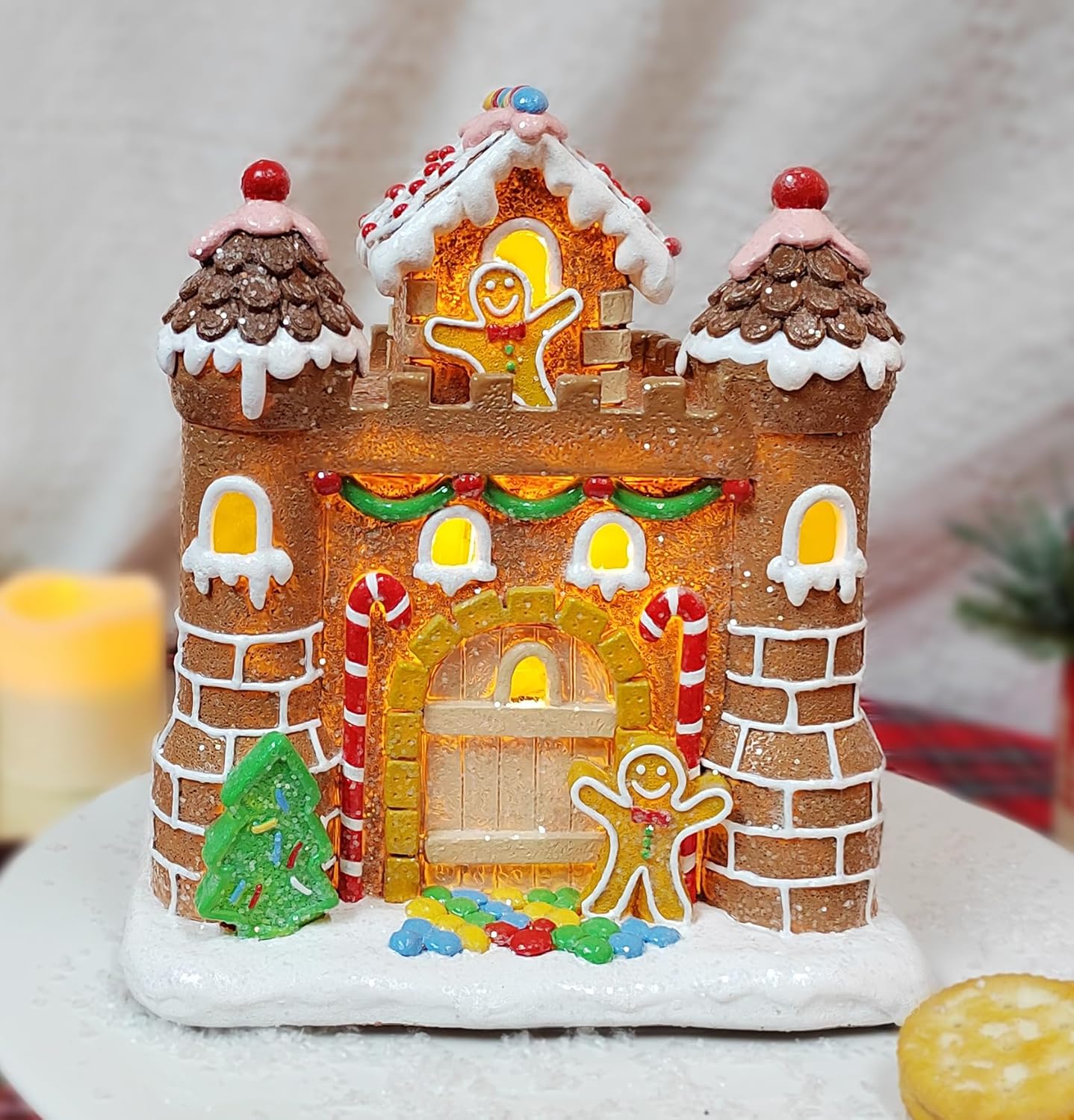 MOMENTS IN TIME Light Up Gingerbread Castle 8.3”H LED Polyresin Christmas Village House Battery Operated Festive Gingerbread Decoration Handcrafted Holiday Home Décor