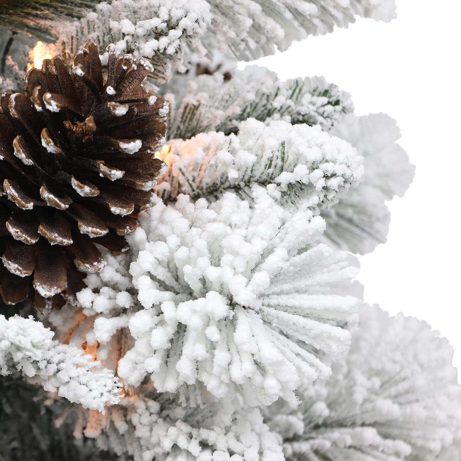 Puleo International 4.5 ft Pre-lit Flocked Potted Tree 382 Tips 100 UL Clear Lights Plastic Rattan-Look Base