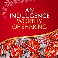 Vista 4 de Lindt Lindor - Trufas de chocolate con leche, chocolates con centro de trufa suave y derretida, bolsa de 8.5 onzas