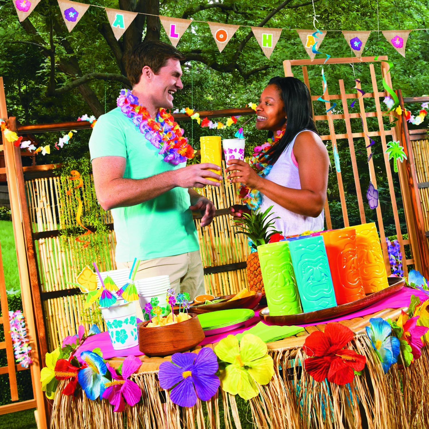 Fun Express Tiki Cups 24 oz Plastic Disposable Party Cups for Hawaiian Luau Party Supplies - 12 Count Multicolor Tropical Glasses for Kids Birthday Beach Summer Events | Authentic Tiki Head Design