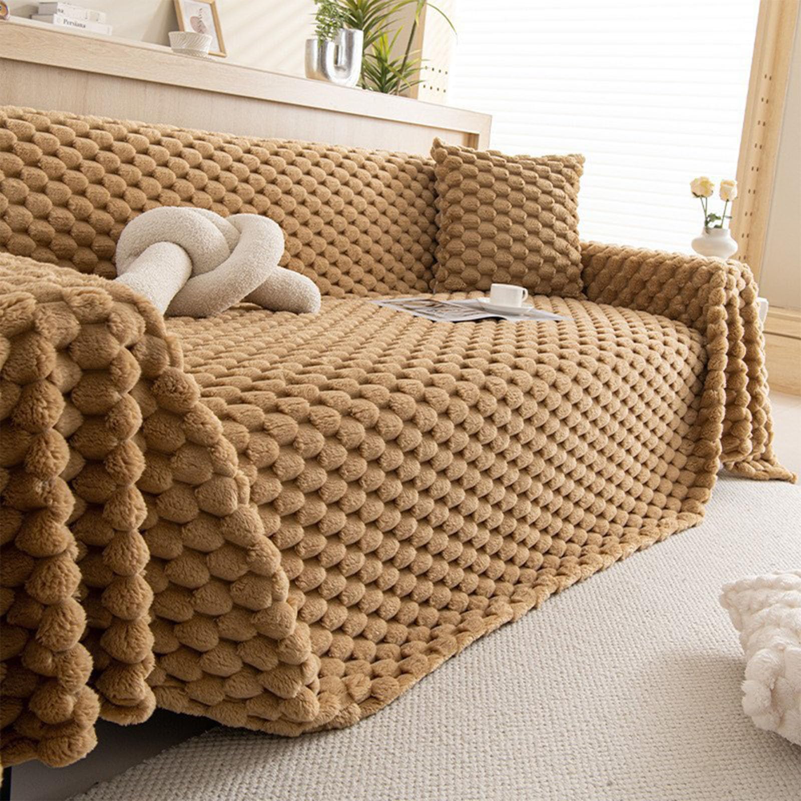 Housse de canapé en fourrure de lapin pour vos soirées d'hiver cocooning