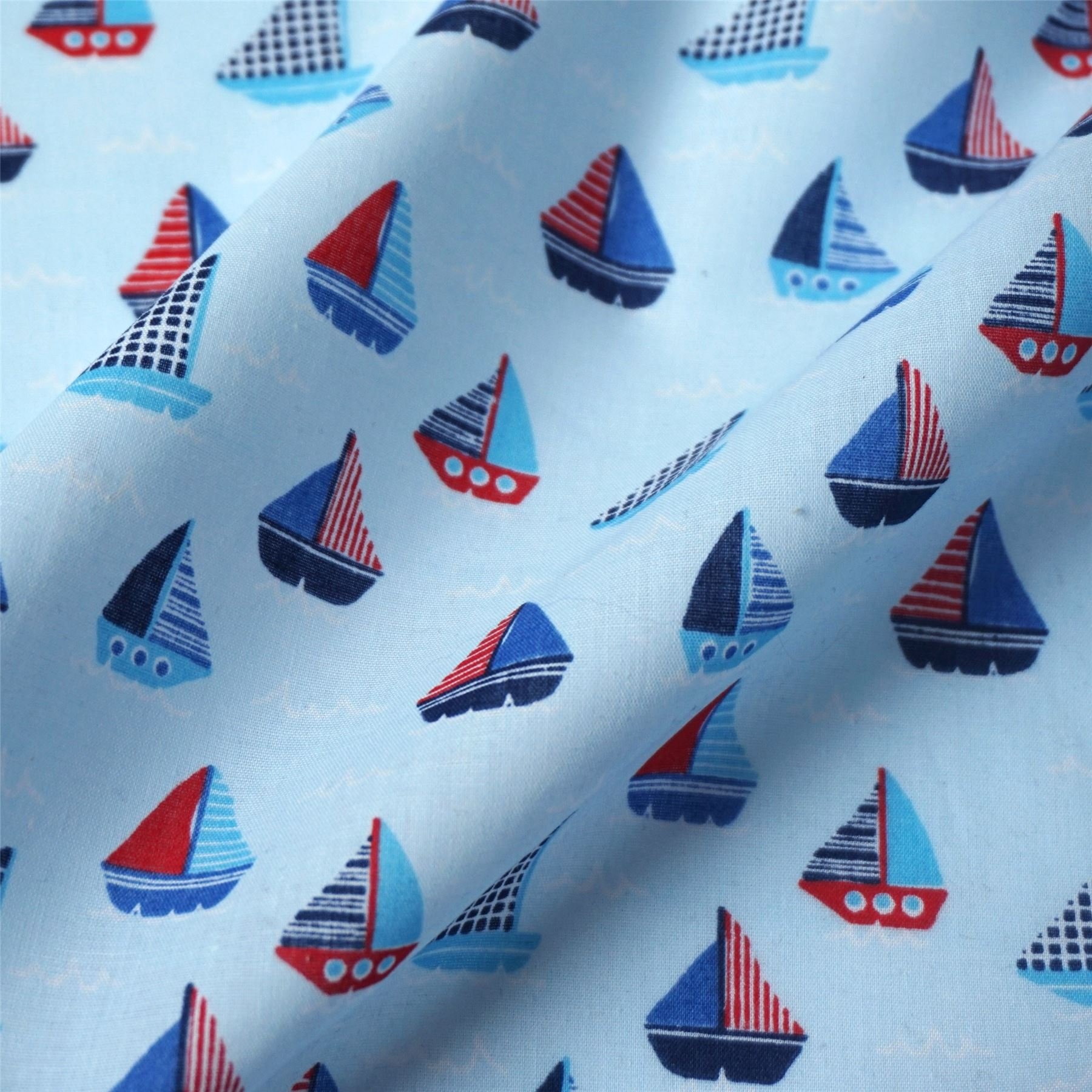 Nortex Mill Sky Blue Polycotton Fabric With Nautical Sailing Boats And Waves (Per Metre)