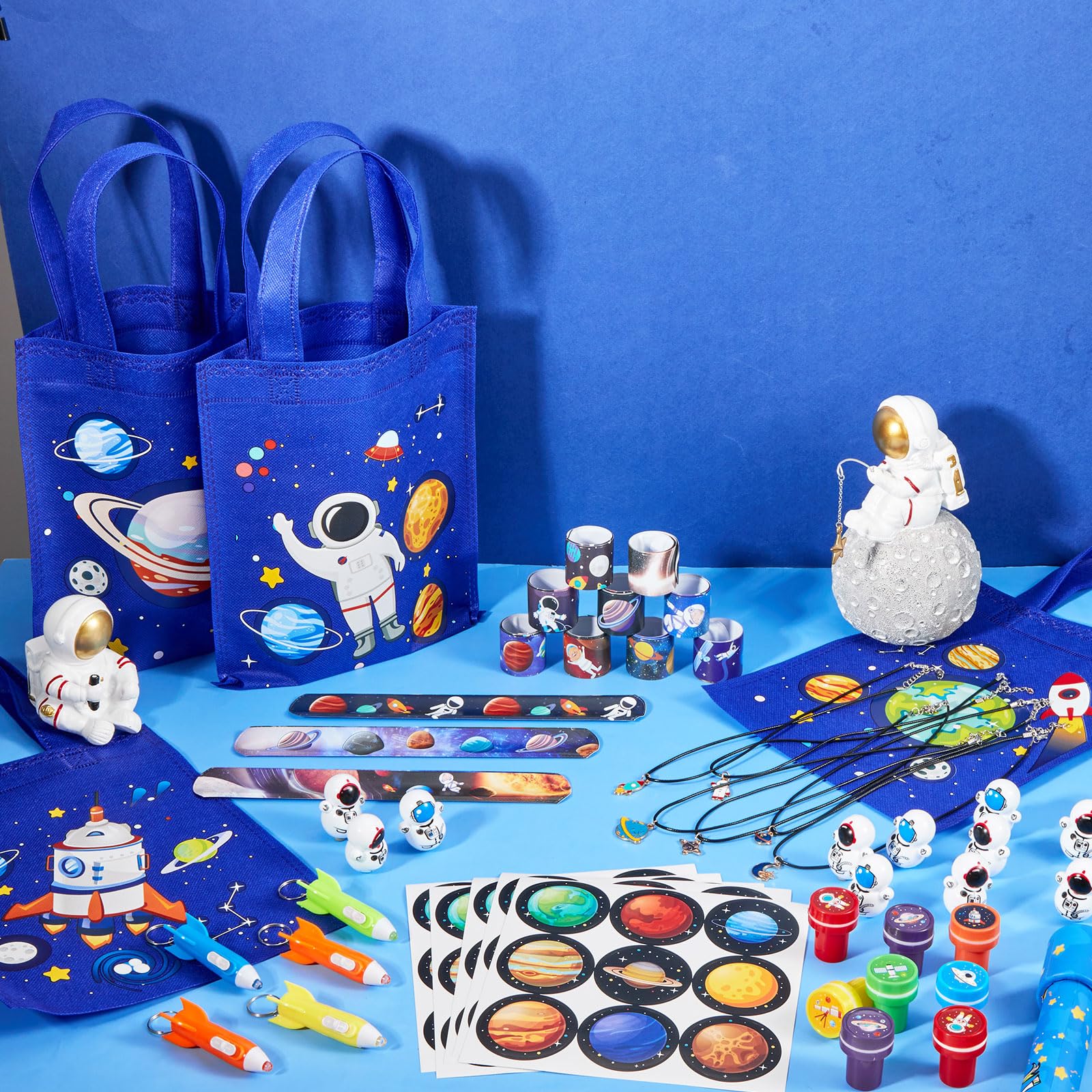 Ctosree 192 Pcs Space Theme Party Favors Space Goodie Non Woven Bags with Handle Slap Bracelet Space Tumbler Space Stampers Space Necklace Space Sticker and Helicopter Keychains for Birthday Party
