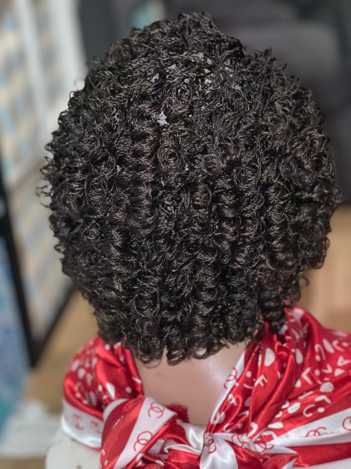 Braided wig. Micro twist wig made on a full lace wig. Color is off black.