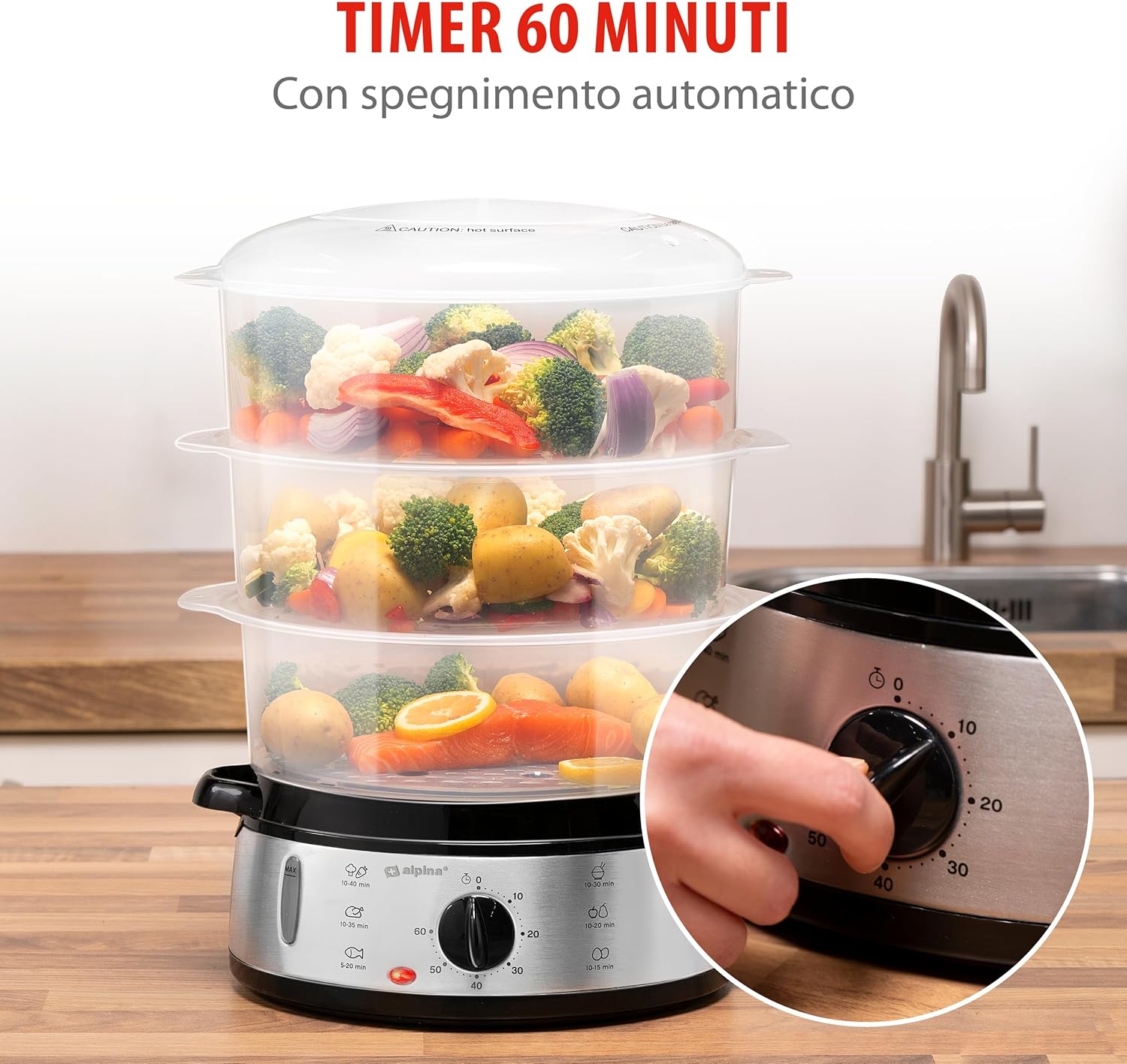 A hand adjusting the 60-minute timer dial on the alpina electric food steamer, with an inset showing a close-up of the timer knob.