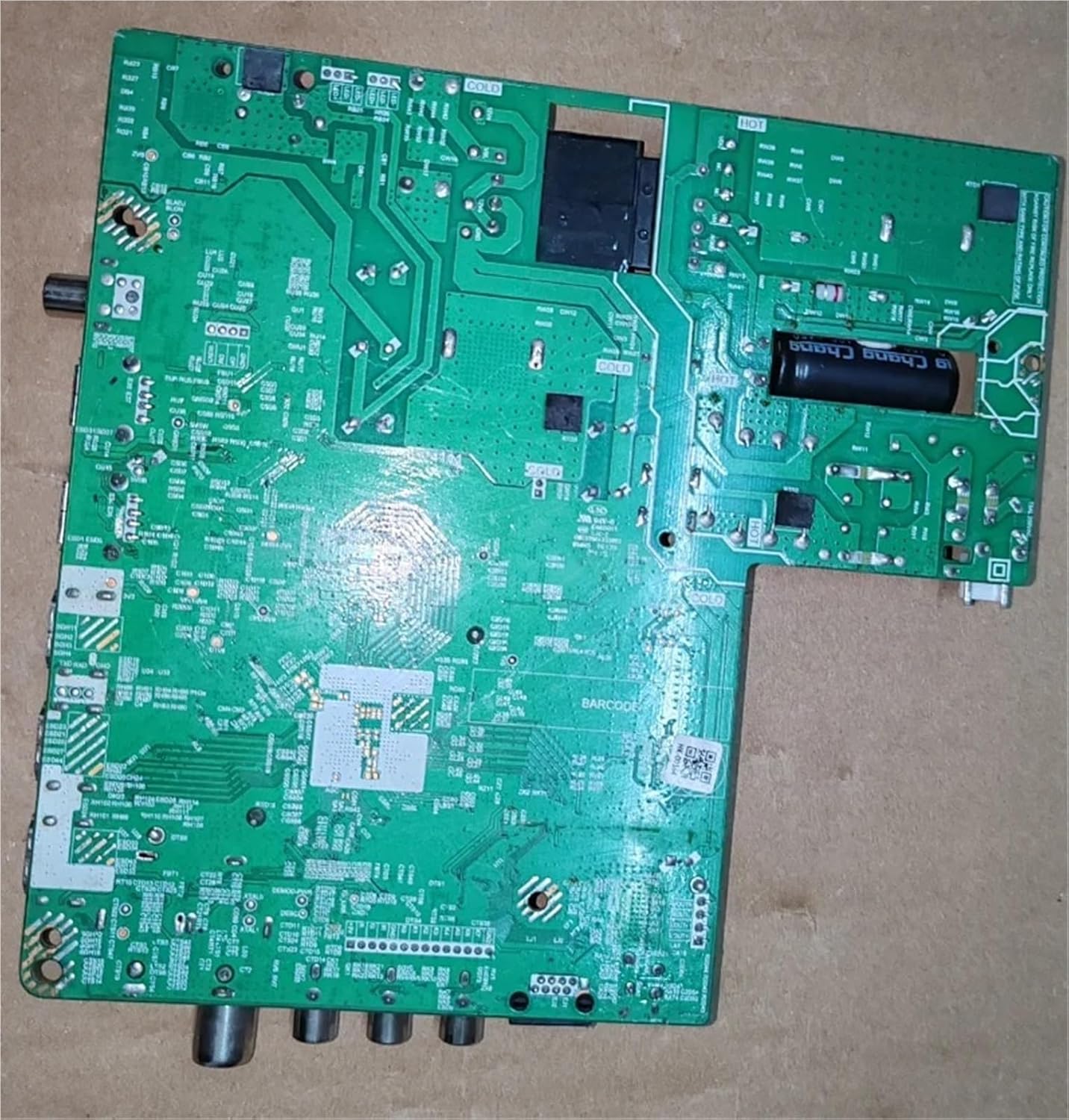 Rear view of the YHNNH S.T.CS2560P739 TV Motherboard, showing various components and connectors.
