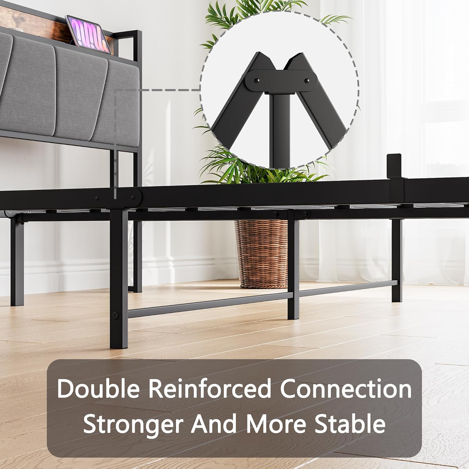 Close-up view of a double reinforced connection point on the bed frame.