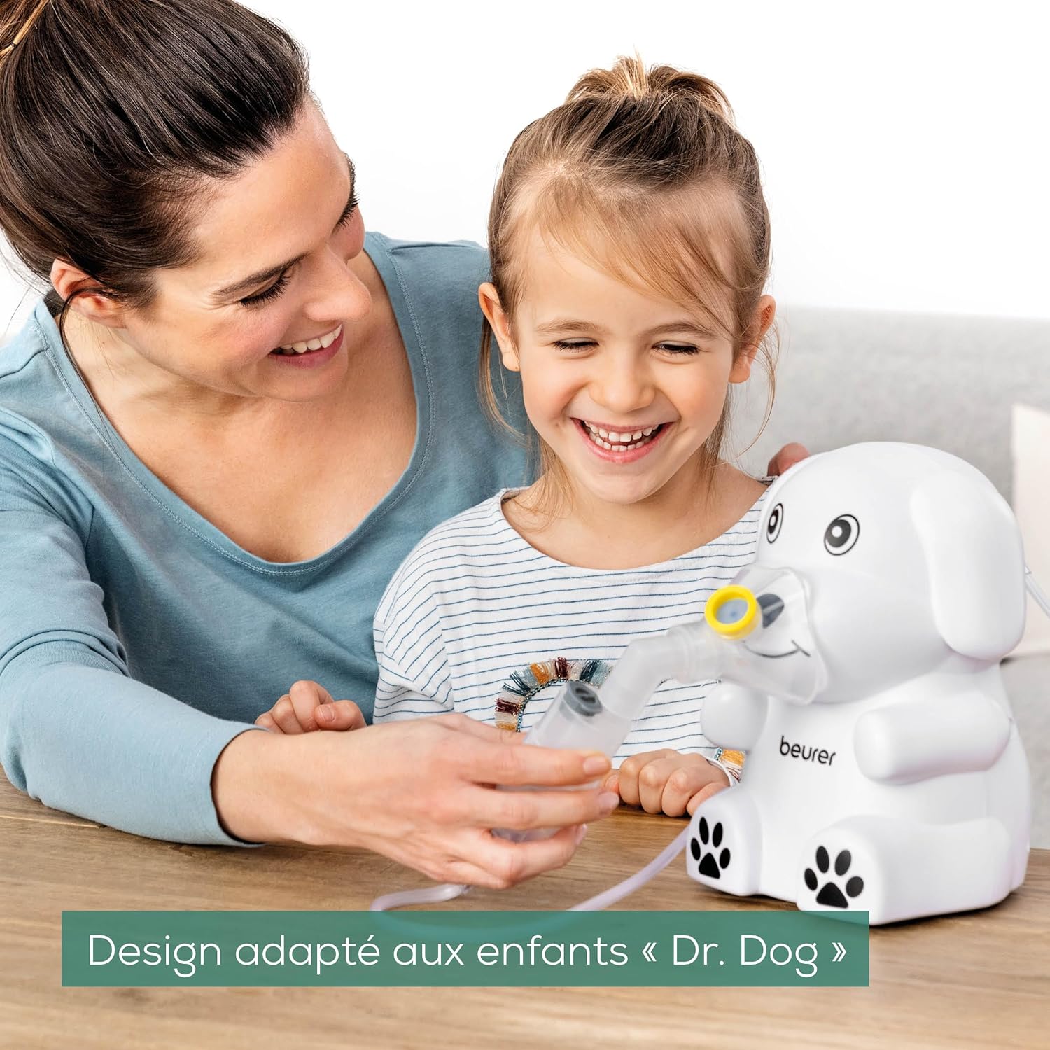 Adult assisting a child with the Beurer IH 24 Kids Nebulizer using a mask