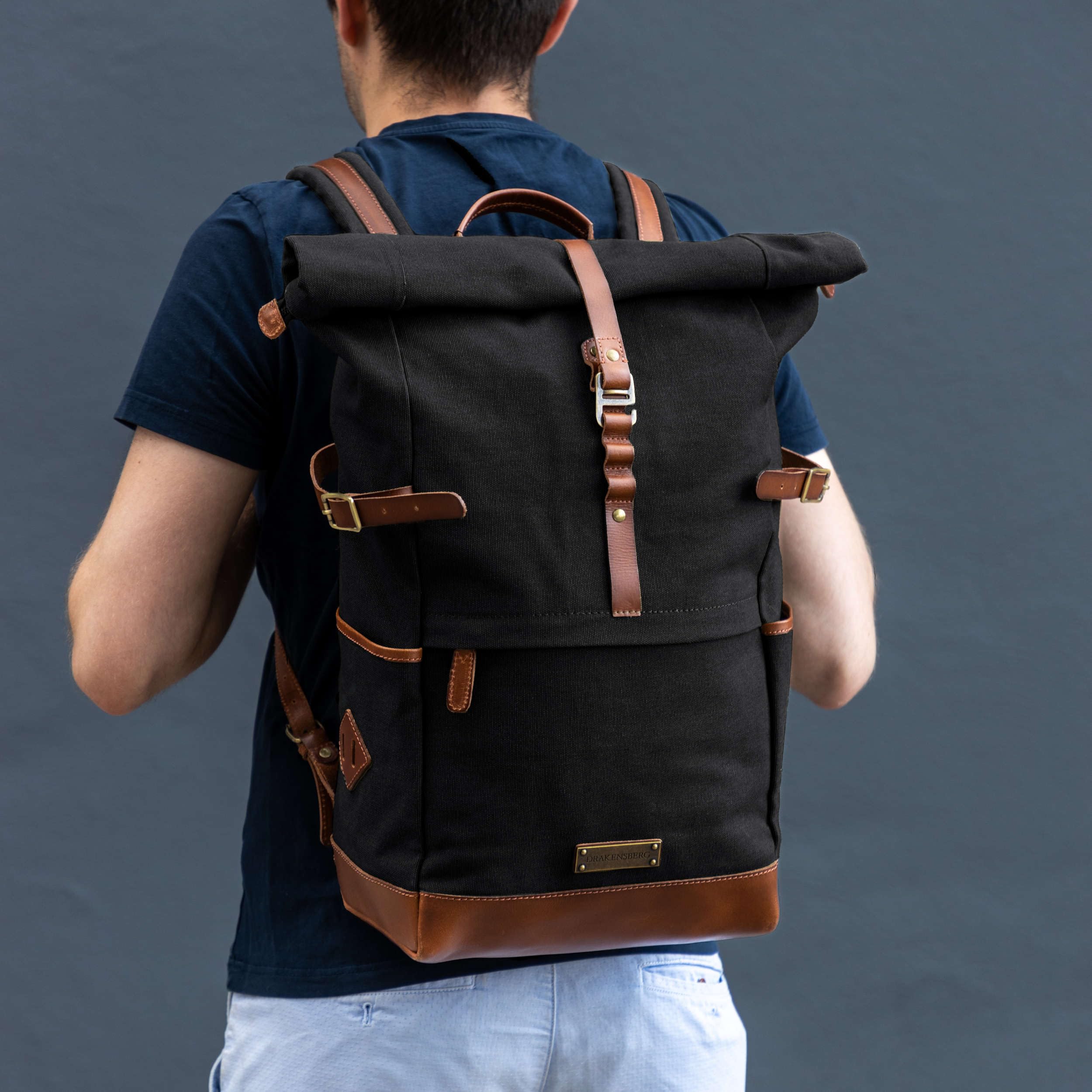 DRAKENSBERG Rolltop-Rucksack 'Wyatt' Herren, Damen, Schwarz | Wasserabweisendes Canvas mit Leder, 16" Laptopfach, 20-30L, DR00186