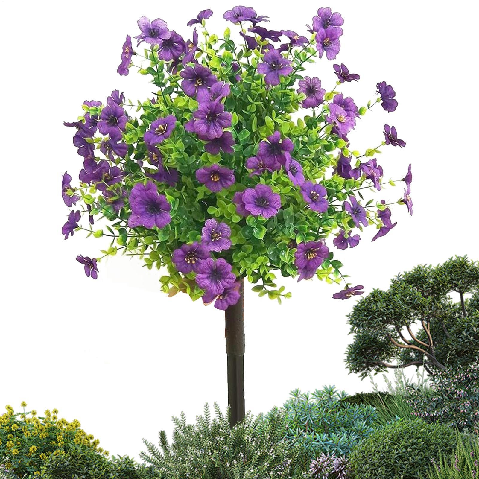 Arbustos artificiales exteriores con flores violetas y estaca