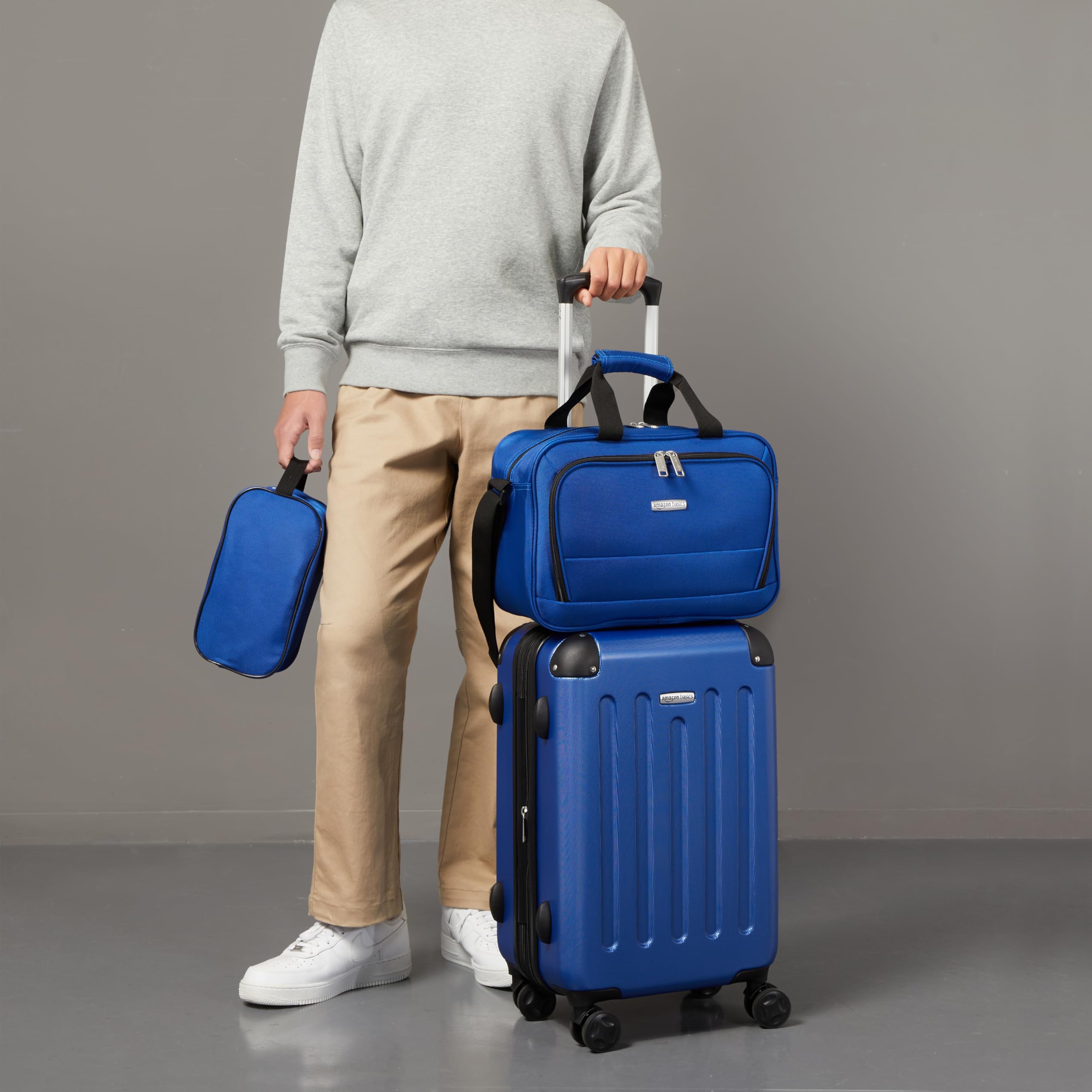 Amazon Basics Set di Valigie Rigide, 3 pezzi, Trolley, Borsa a mano, Borsa da viaggio compatta, Espandibili, 4 Ruote Girevoli, Blu Navy