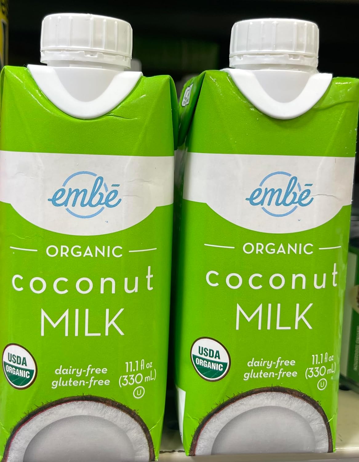 Embi Organic unsweetned coconut milk 2 pack. DMC spoon