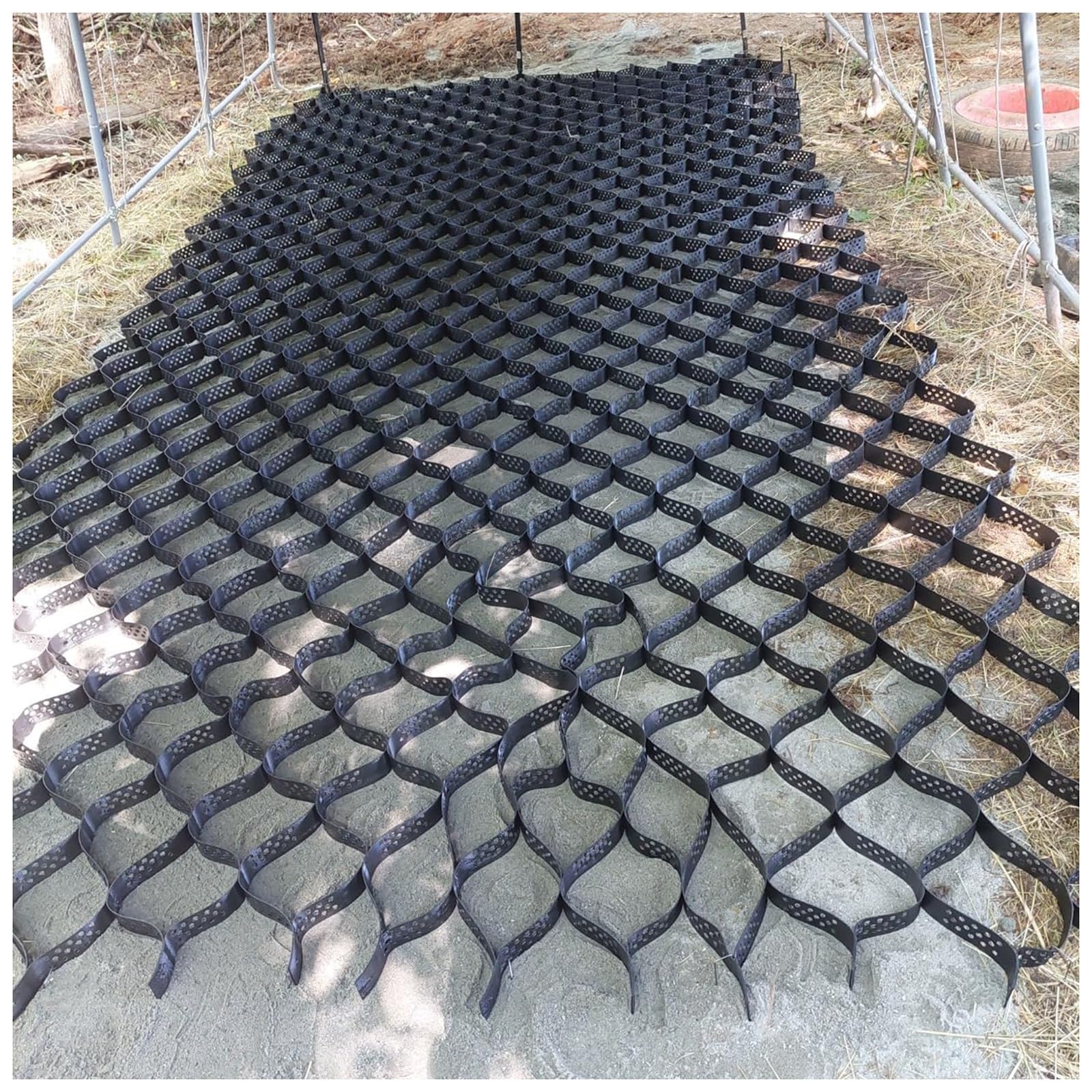 Pavés de gravier perméables flexibles allée pente 10m long