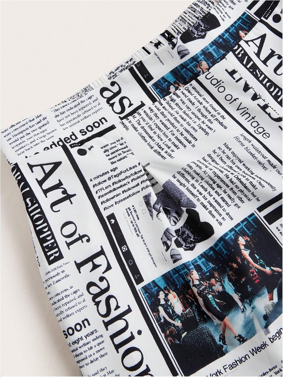 WDIRARA Women's Plus Size Newspaper Print Wide Leg Pants Elastic High Waisted Palazzo Pants with Pockets - Image 5