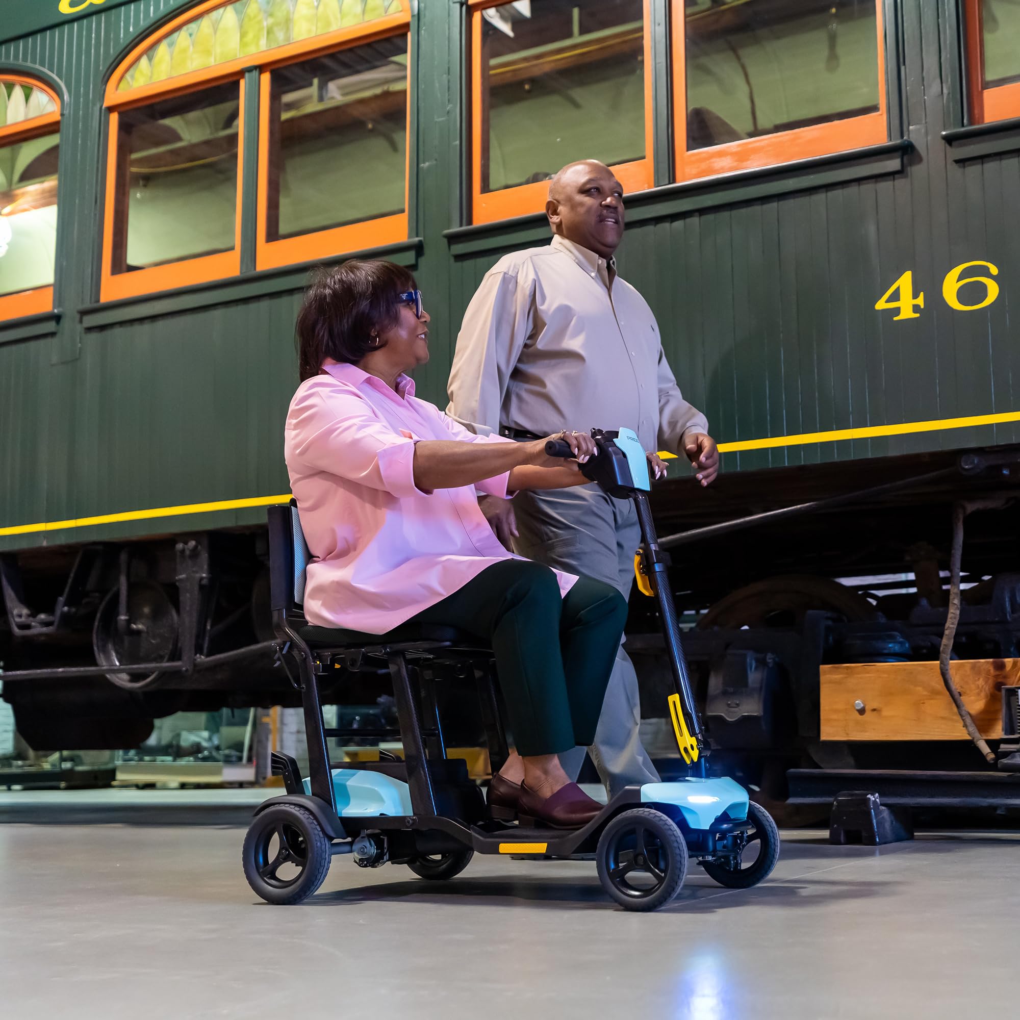Pride Go Go - Scooter súper portátil + kit de actualización de viaje