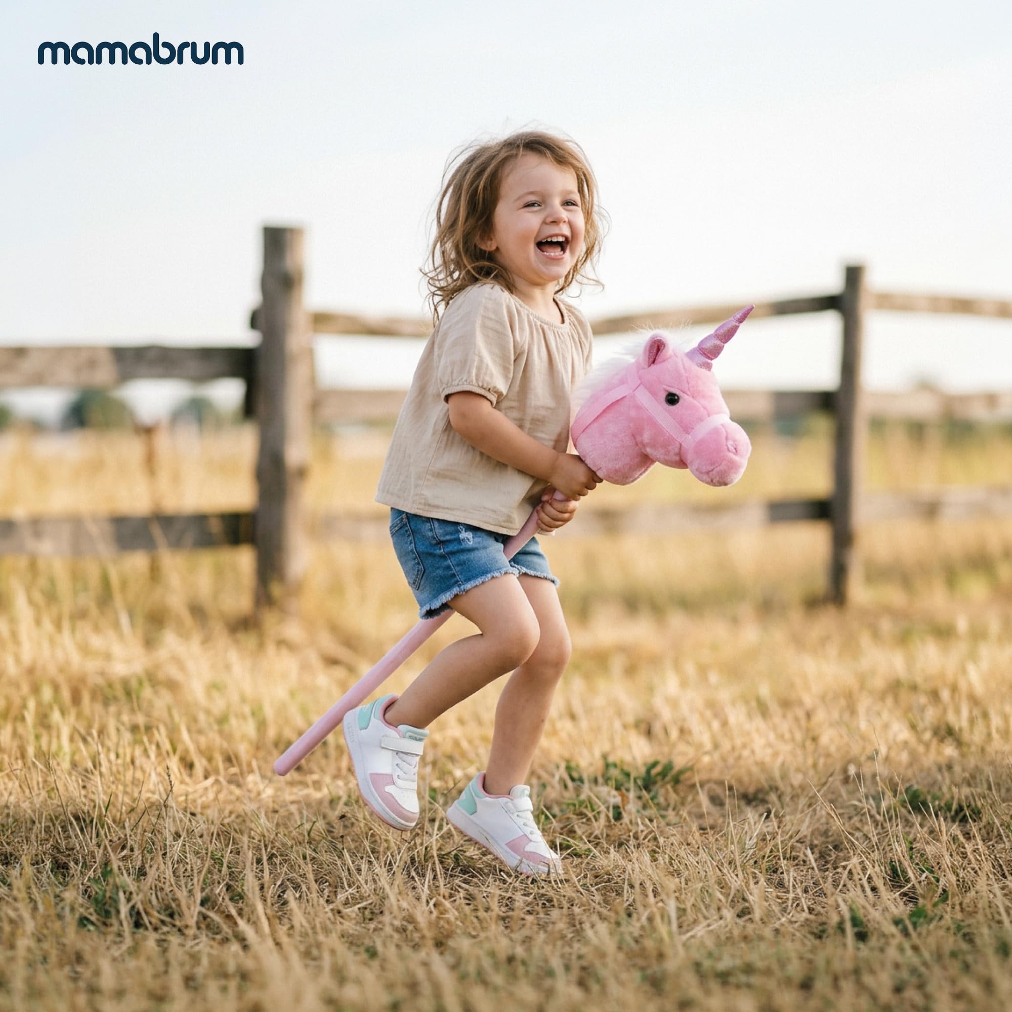 mamabrum Hobby Horse Einhorn Rosa Steckenpferd Kinder 80 cm | Magisches Einhorn mit Glitzerhorn, weichem Plüschkopf und festen Zügeln für fantasievolle Bewegungsspiele.
