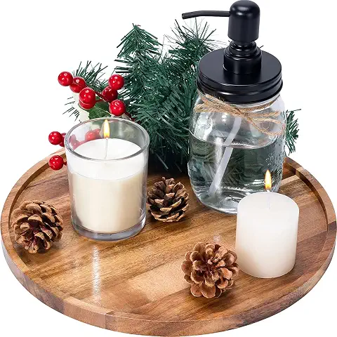 Coffee table books, trays, candles, and small decorative pieces make the room feel professionally styled. These small details add character and complete the luxury aesthetic.