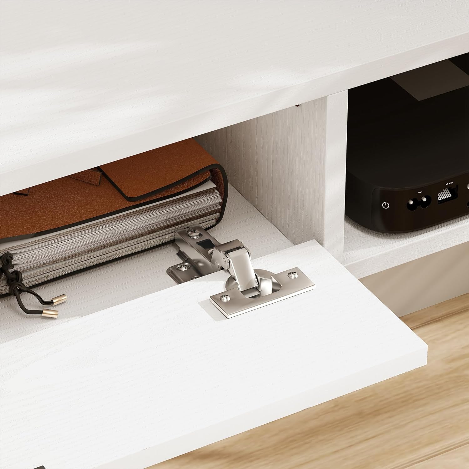 Close-up of the flip-down drawer hinge mechanism