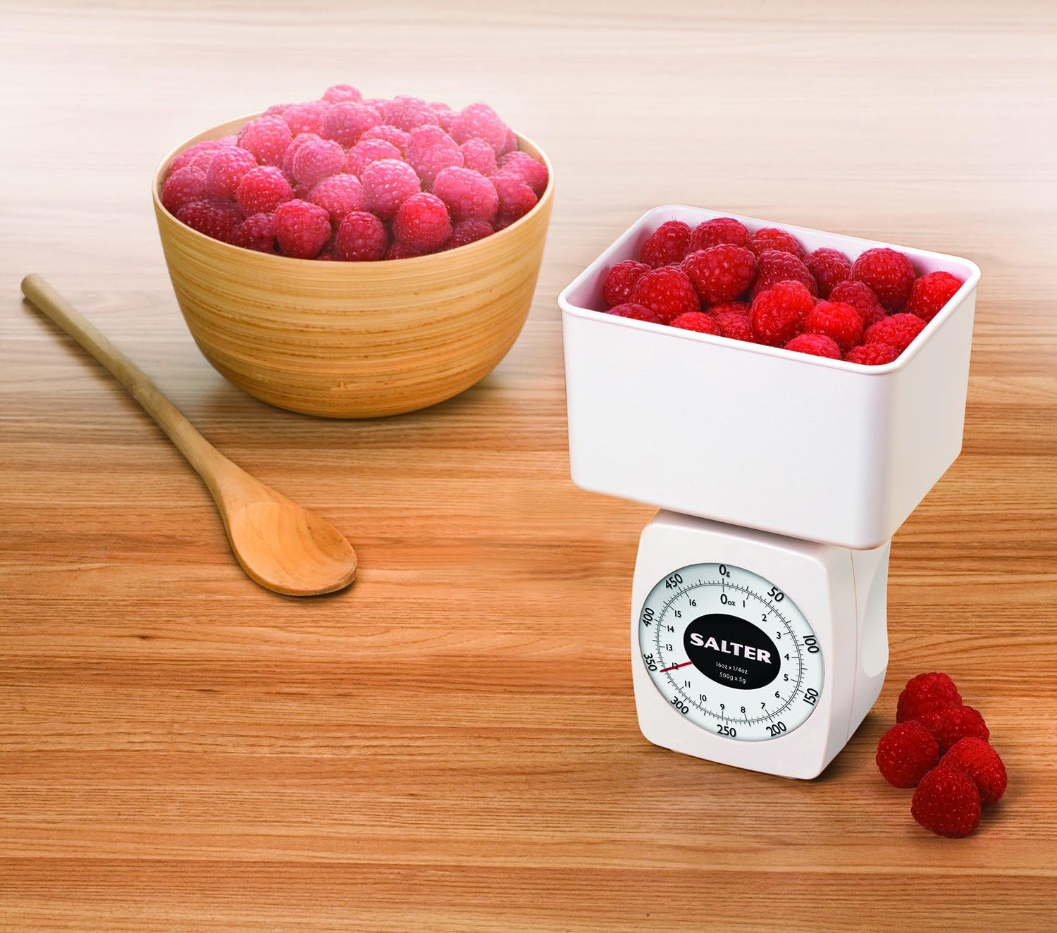 Salter Mechanical Diet Scale in use with a bowl of raspberries