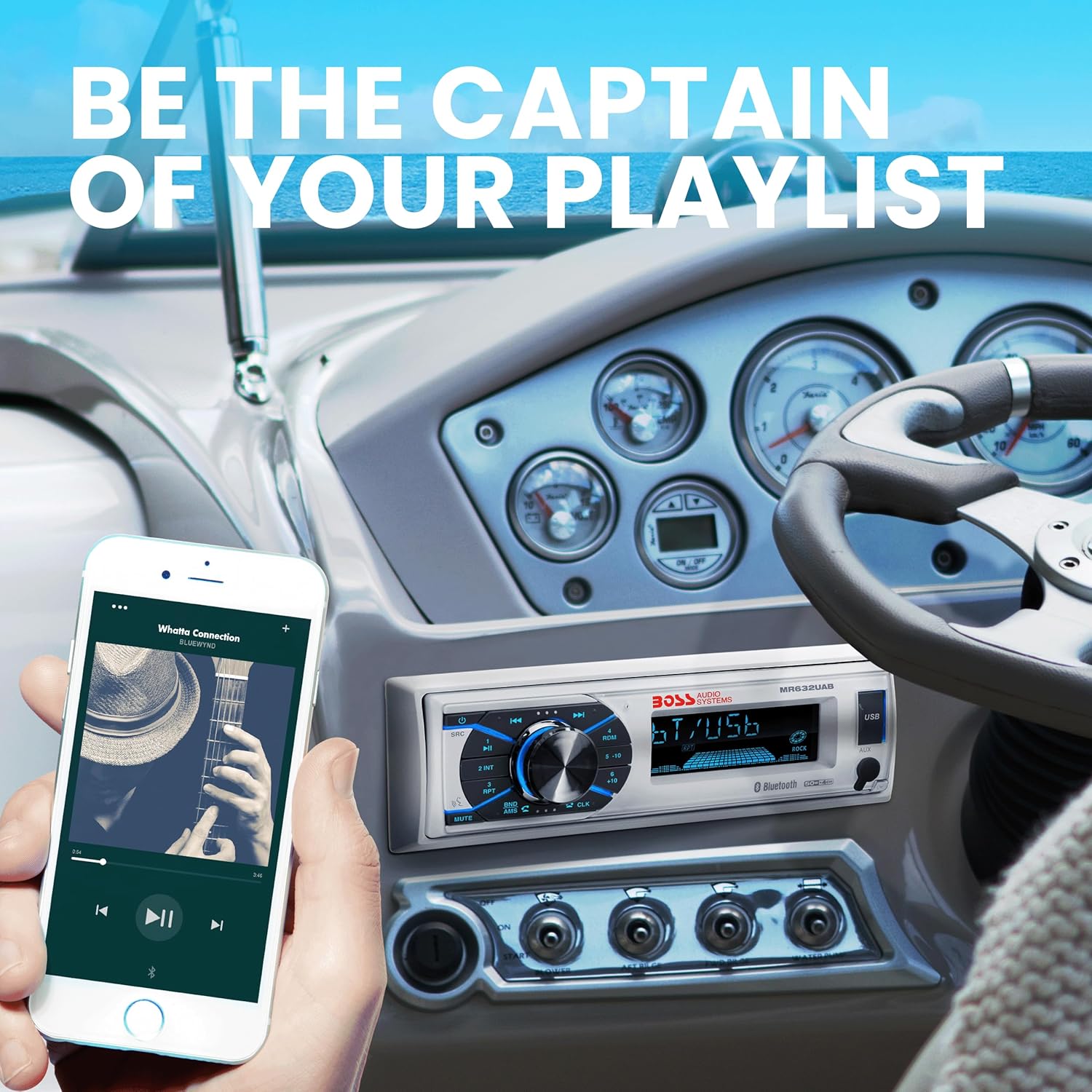 Person holding a smartphone connected via Bluetooth to the marine stereo system installed in a boat dashboard