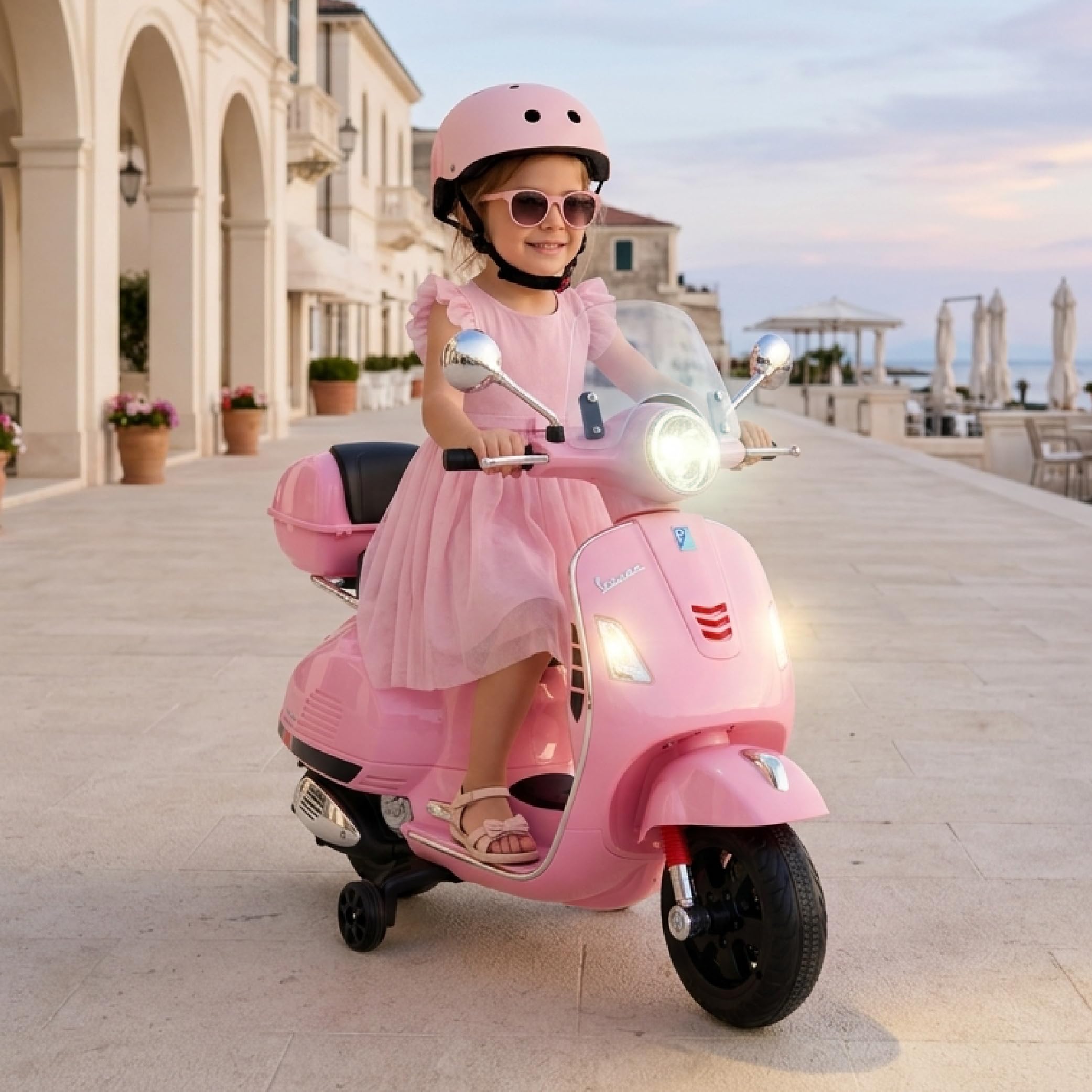 Moto Eléctrica Vespa para Niños con Ruedas y Asiento de plástico, Maletero, Reproductor MP3, Toma AUX USD MicroSD (Rosa Claro)