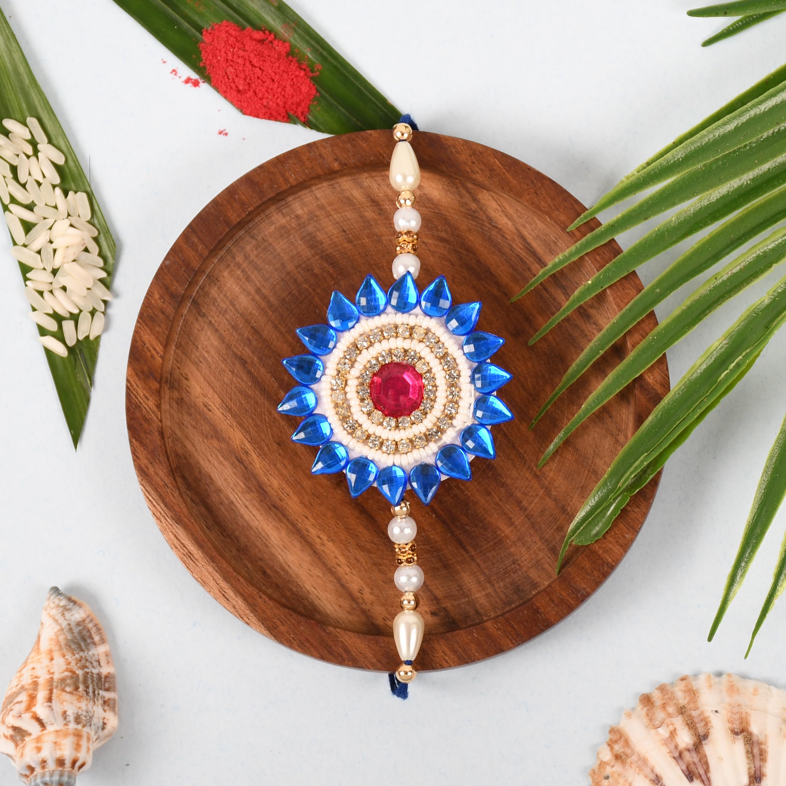Indian Karigar Rakhi For Brother With Gift Combo Set With Wax Tea Light Candle Puja Essentials And Greeting Card In Rakhi Gift Box Rakhi With Gift For Brother Kids Rakhi Combo (Rakhi For Brother Blue) (B0D44STF3F) Amazon Price History, Amazon Price Tracker