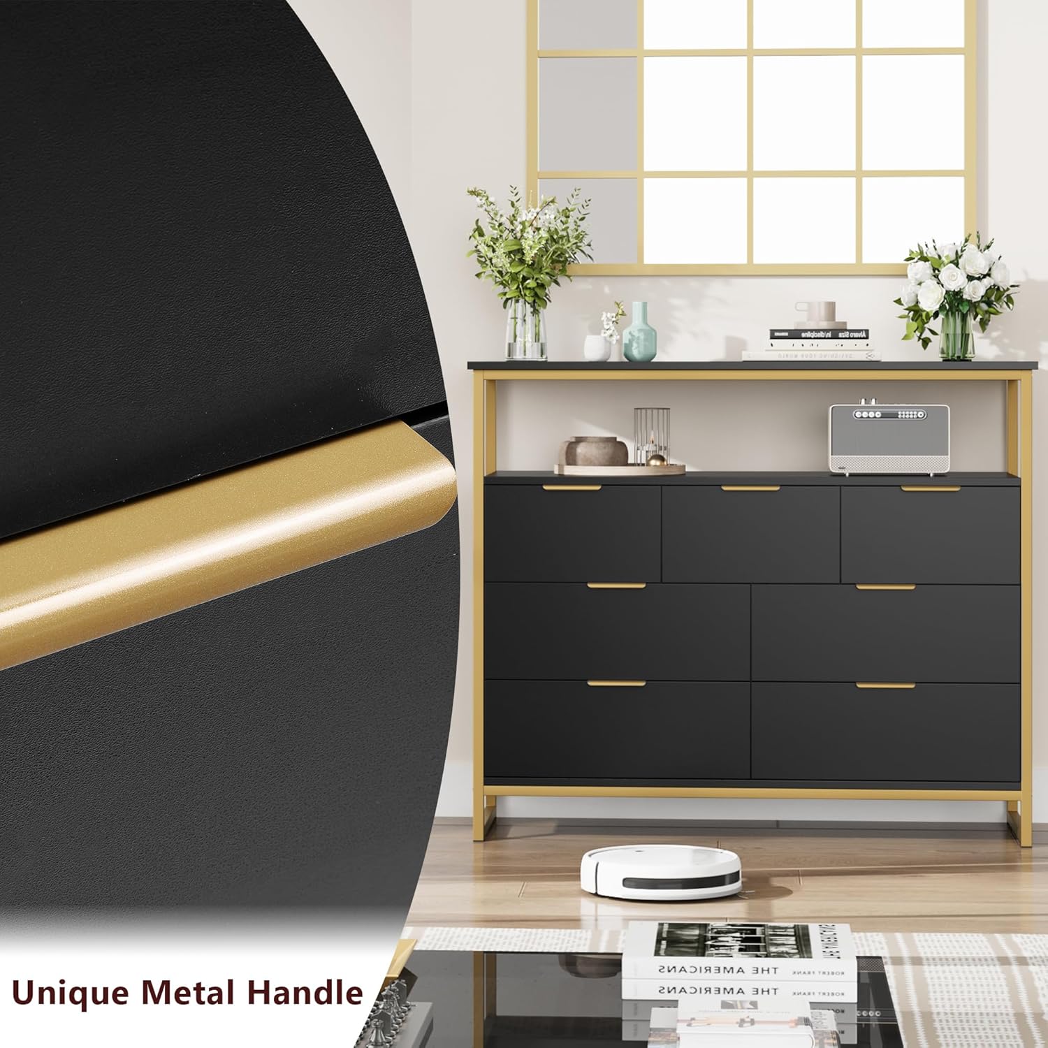 Close-up of a black drawer front with a gold metal handle.