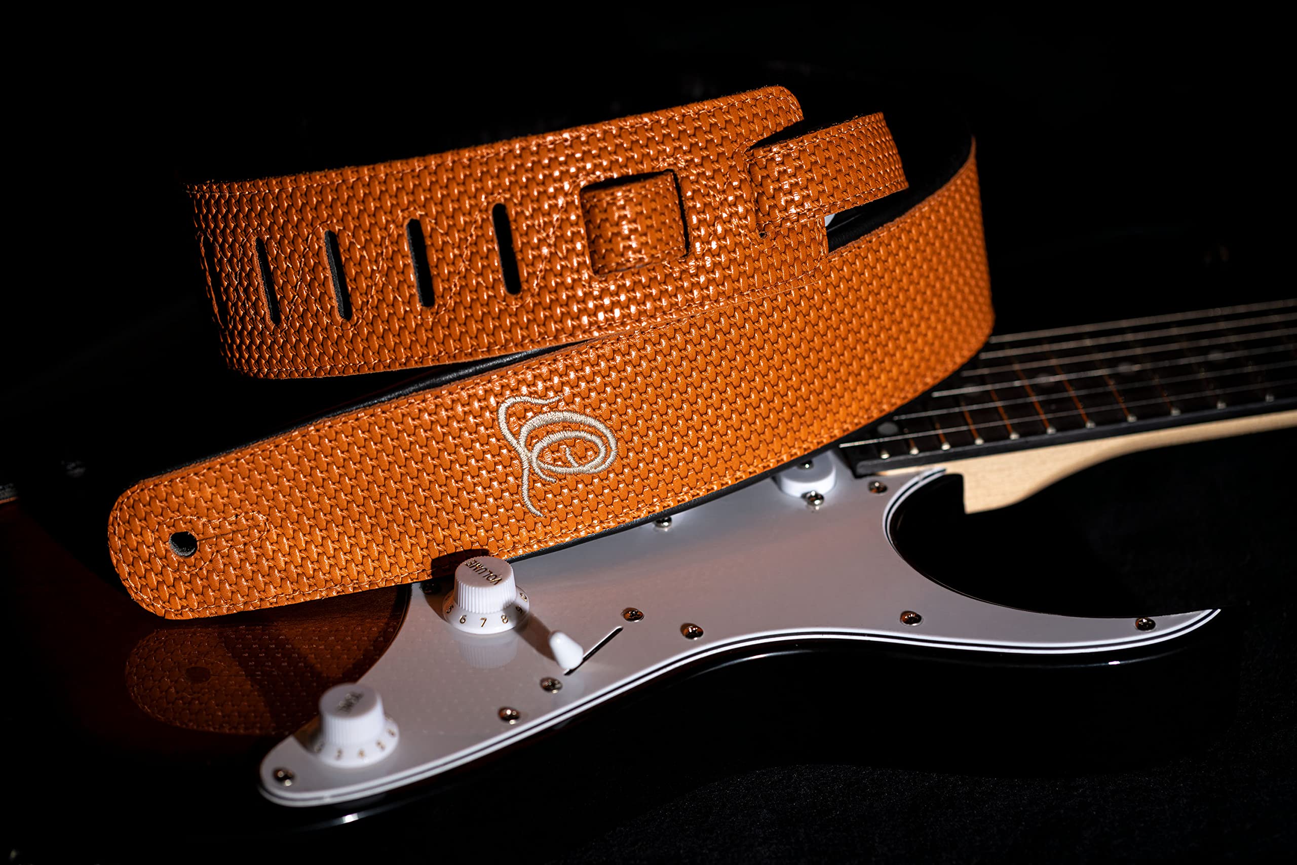 Ortega Guitars Gitarrengurt Länge Verstellbar - Akustik Gitarre / Bass, E-Gitarre, E-Bass - Custom Series - Echtleder, Orange Braid (OSCU-6)