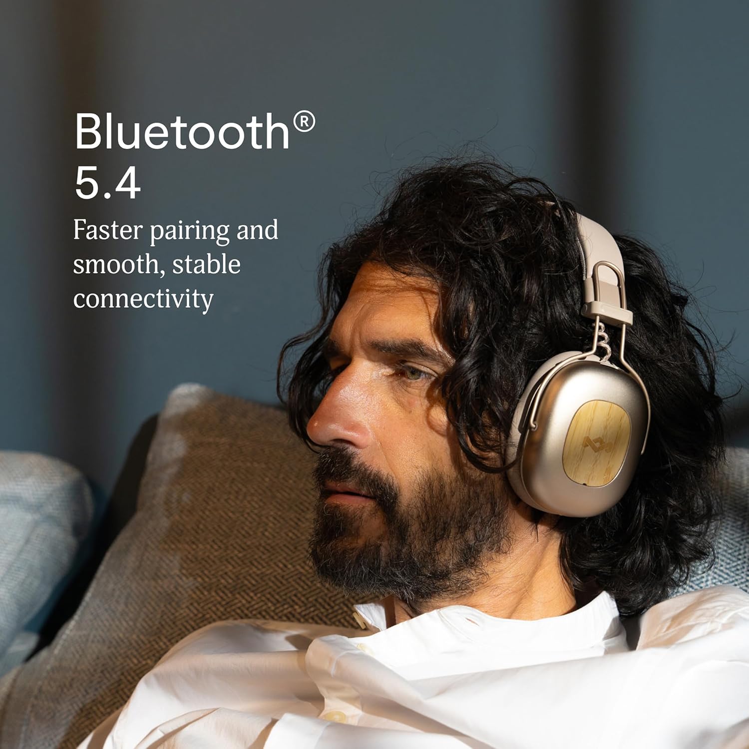 Man wearing House of Marley Positive Vibration Rebel headphones, illustrating Bluetooth 5.4 connectivity