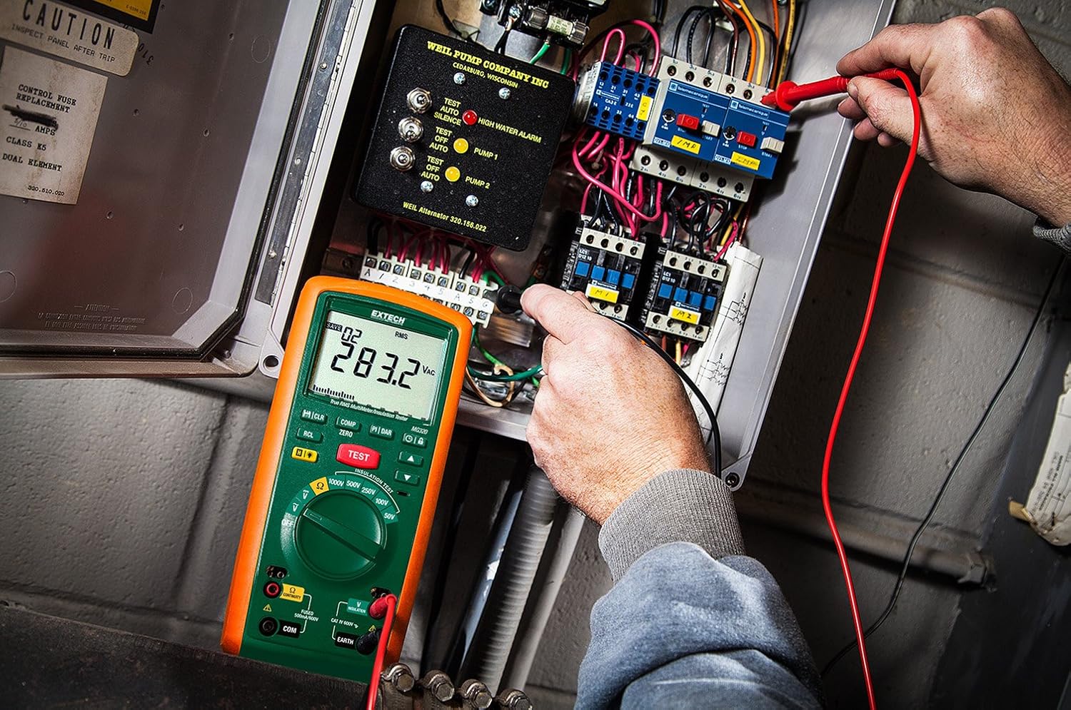 User testing an electrical panel with Extech MG320