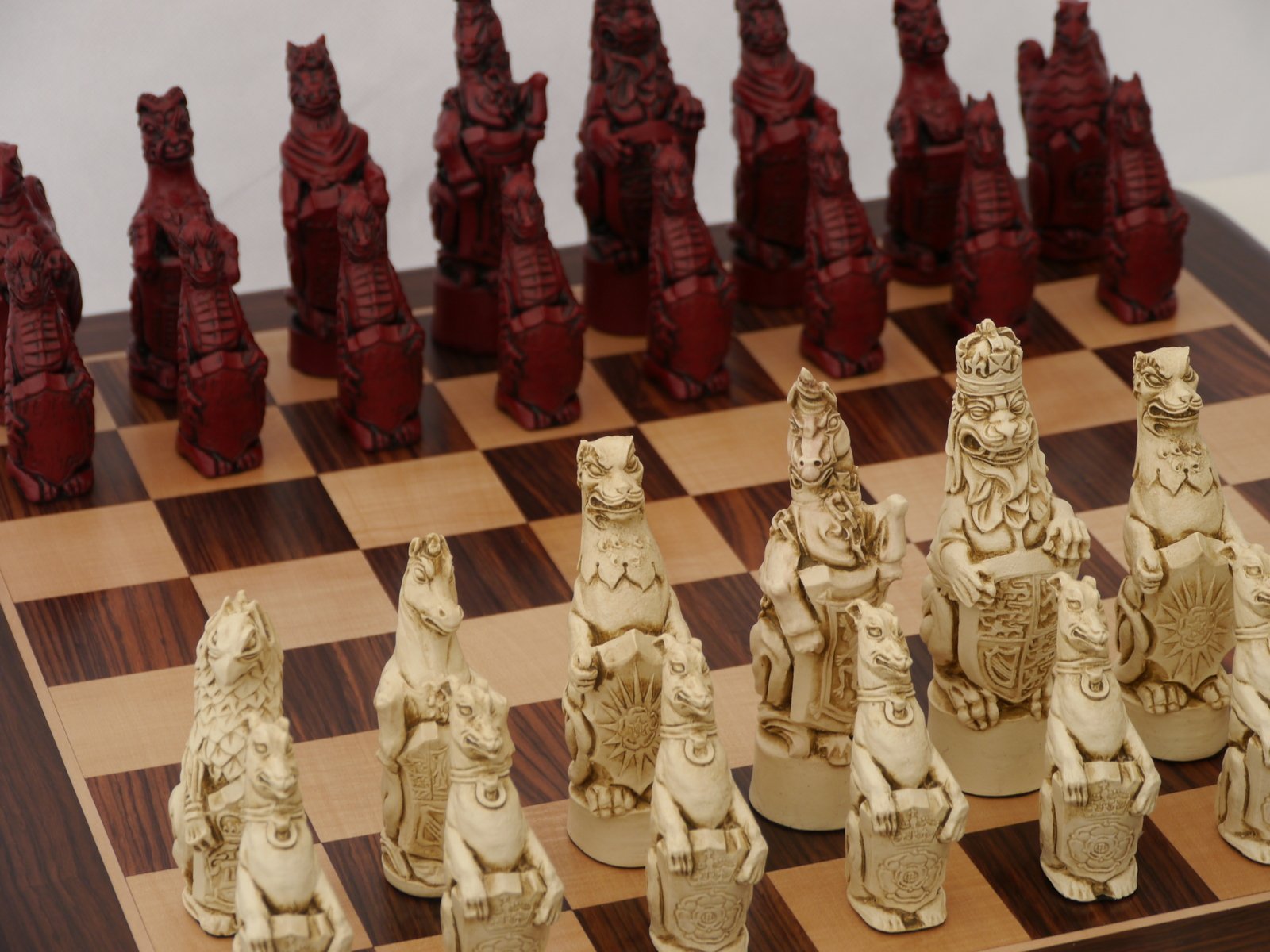 Berkeley Chess Royal Beasts Ornamental Chess Set (cream & red, board not included)