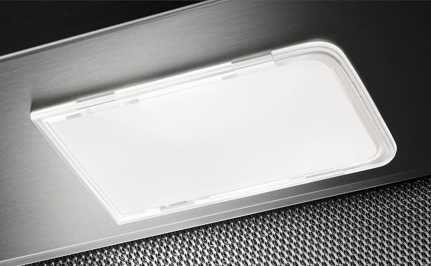 Close-up of an integrated LED light on the Zanussi ZFP216S cooker hood.