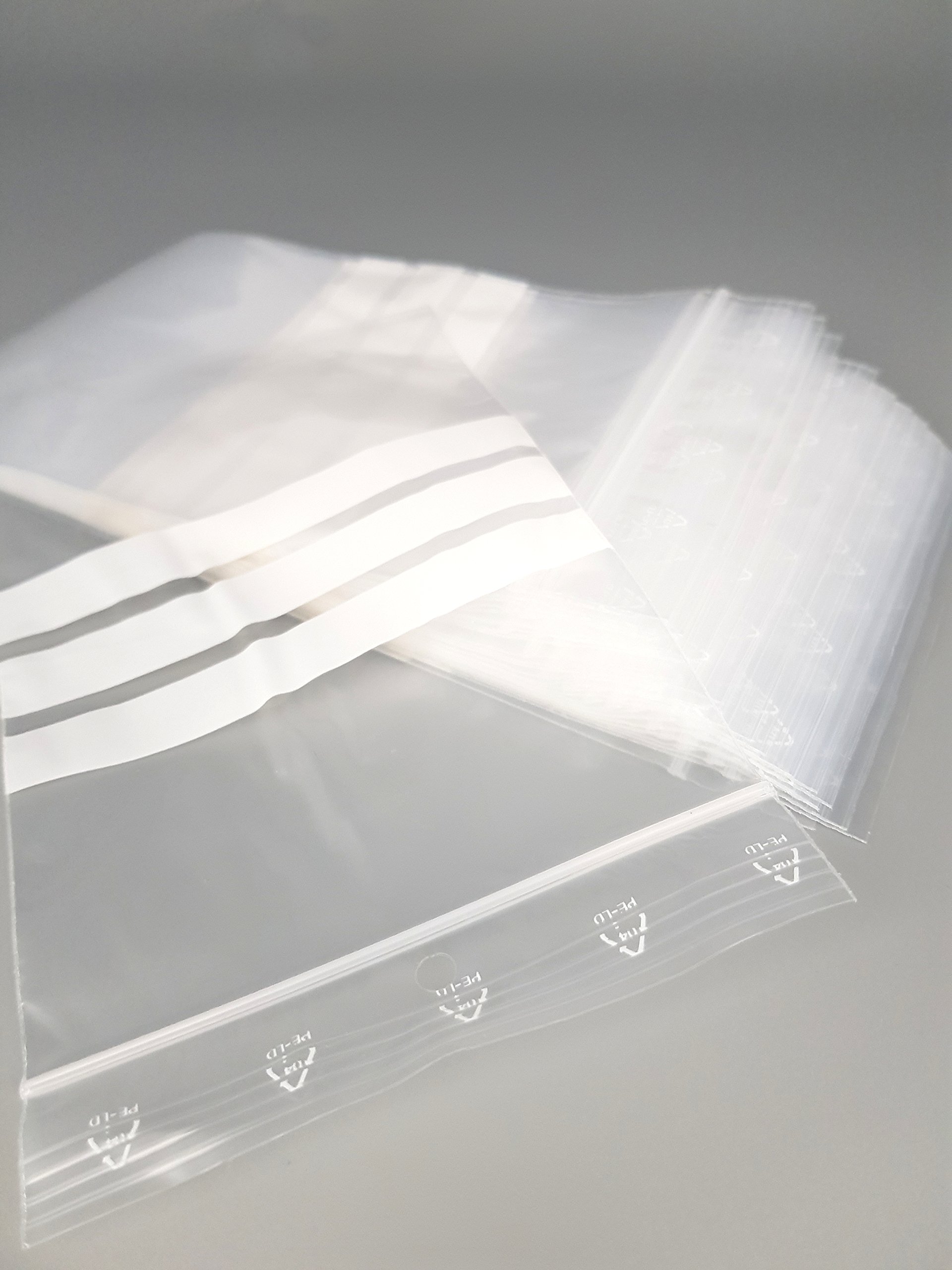 Bolsa con cierre zip y 3 tiras blancas, lote de 100, 50 micras (100 mm x 150 mm)