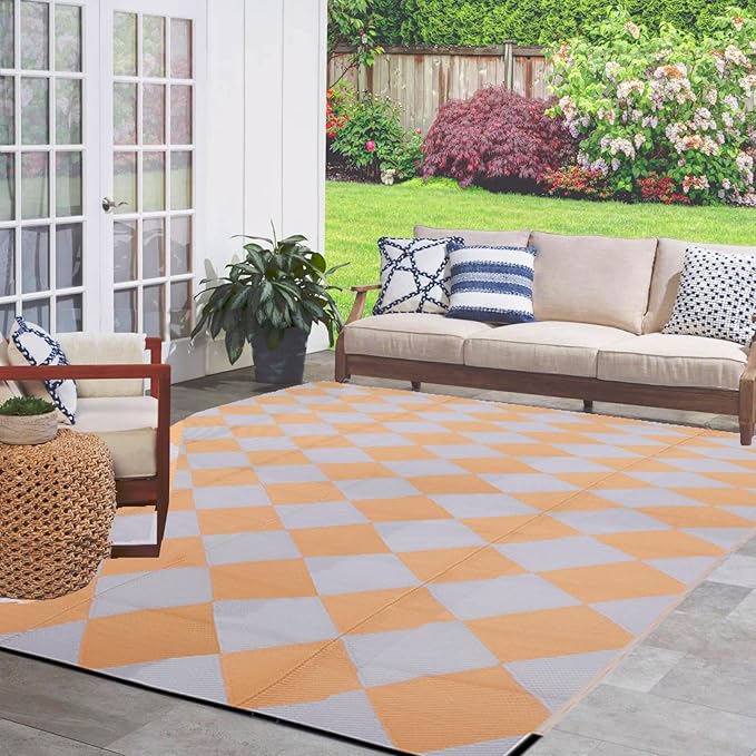 Made from durable plastic straw, this rug is not only waterproof but also reversible, allowing you to change up the look of your outdoor space easily. The geometric design adds a touch of style to any setting, while the material is easy to clean and maintain, making it perfect for high-traffic outdoor areas.