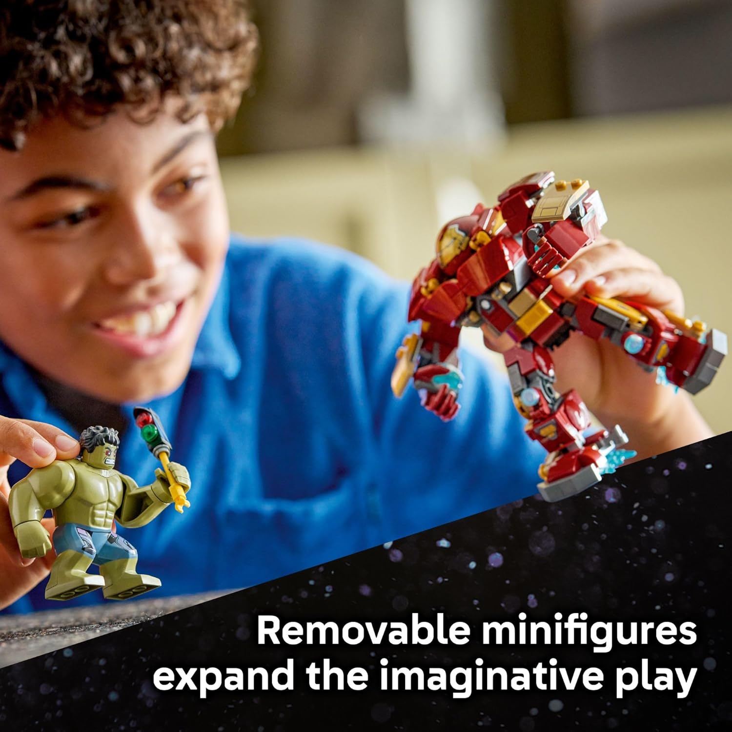 Child playing with LEGO Hulkbuster and Hulk minifigure
