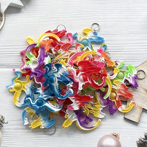 Miniatura 7 de Paquete de 30 juguetes para la ansiedad con diseño de dragón a granel arcoíris para niños, regalos de fiesta de cumpleaños, vacaciones, regalos y