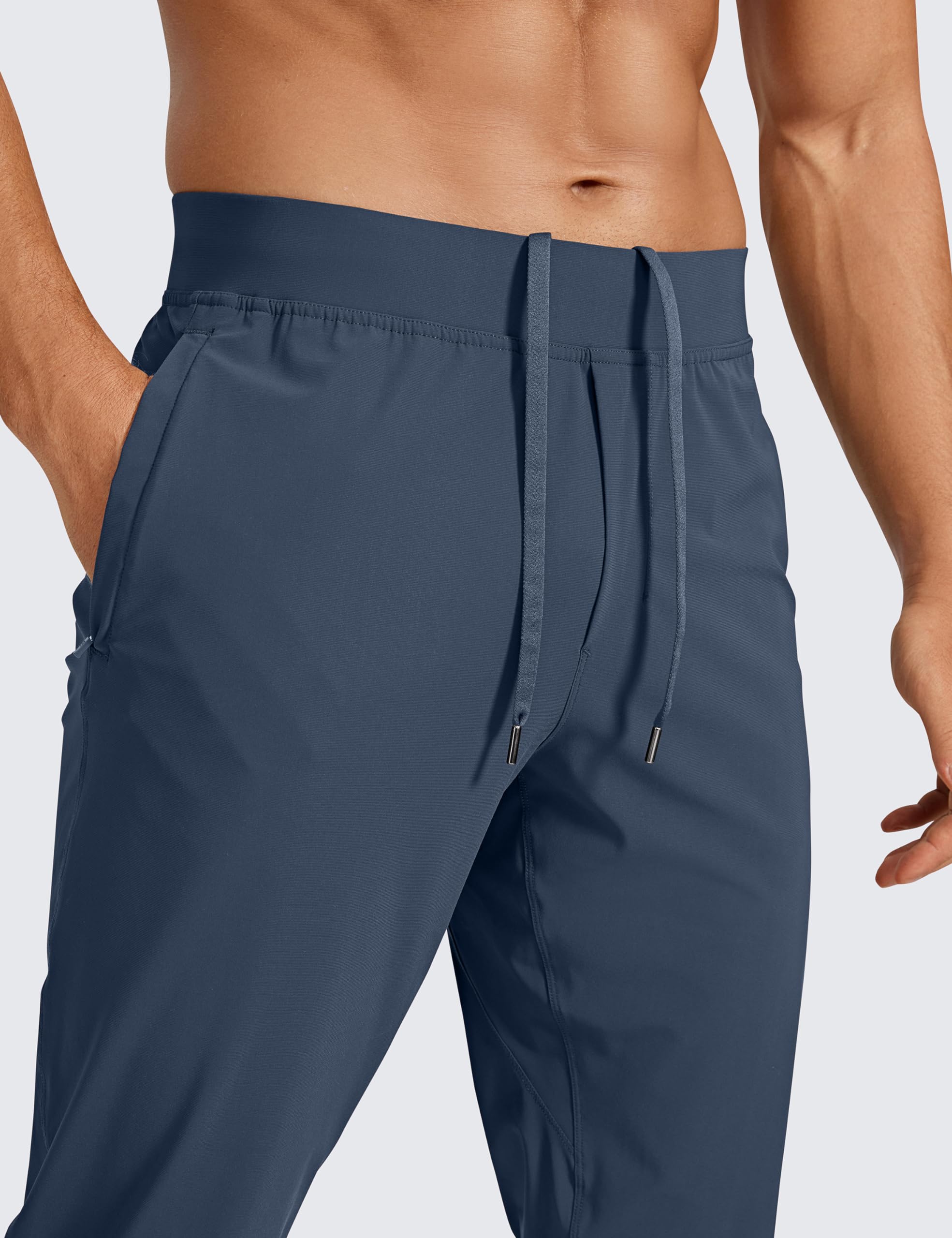 CRZ YOGA Athletic Joggers para Hombre Ligero Ejecutar Formación Pantalones con Bolsillos con Cremallera y Cremalleras de Tobillo 29"