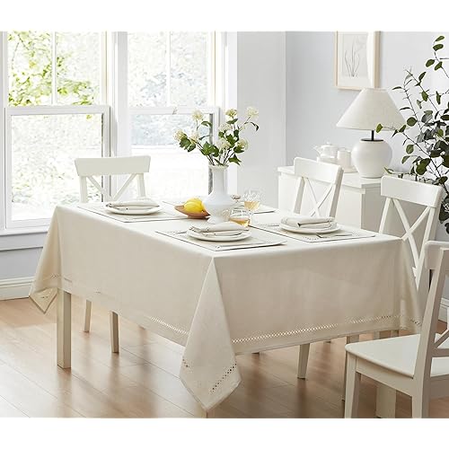 Newbridge Fabric Rectangle Tablecloth, 60 x 84 Inch, Easter Provence Lattice Cutwork Solid Color Textured, Water and Stain Resistant Easy Care Fabric Table Cloth for Spring Parties, Ivory