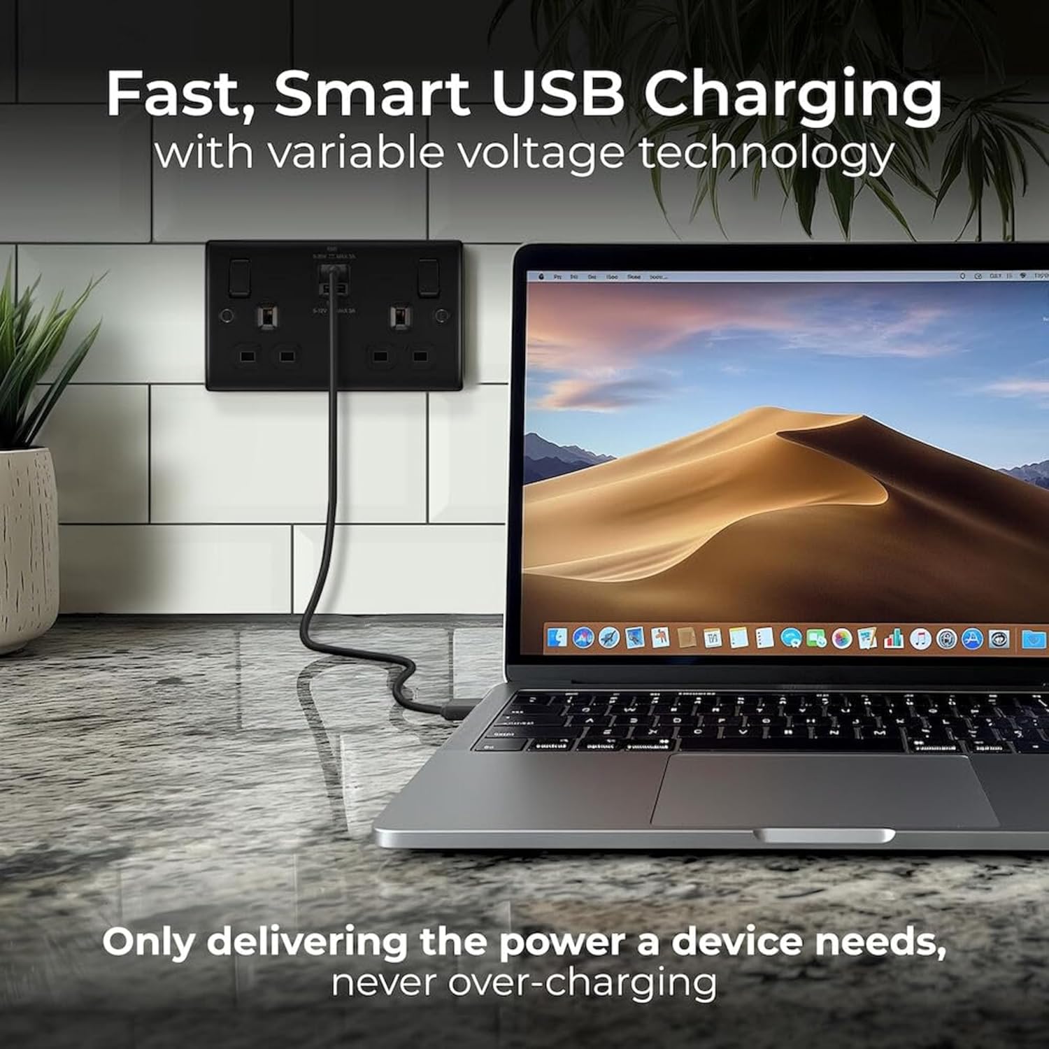 Laptop charging via the USB-C port of the wall socket.