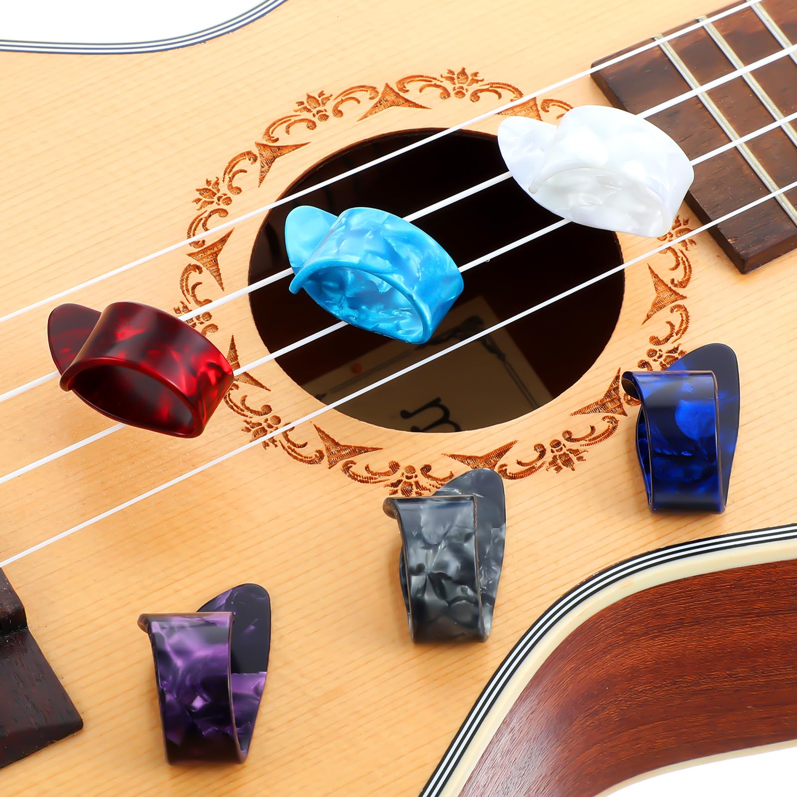 Ymapinc Lot de 12 médiators de pouce pour guitare acoustique, électrique, banjo, ukulélé, harpe, basse, doigt pour musiciens, 6 couleurs, plastique ABS durable