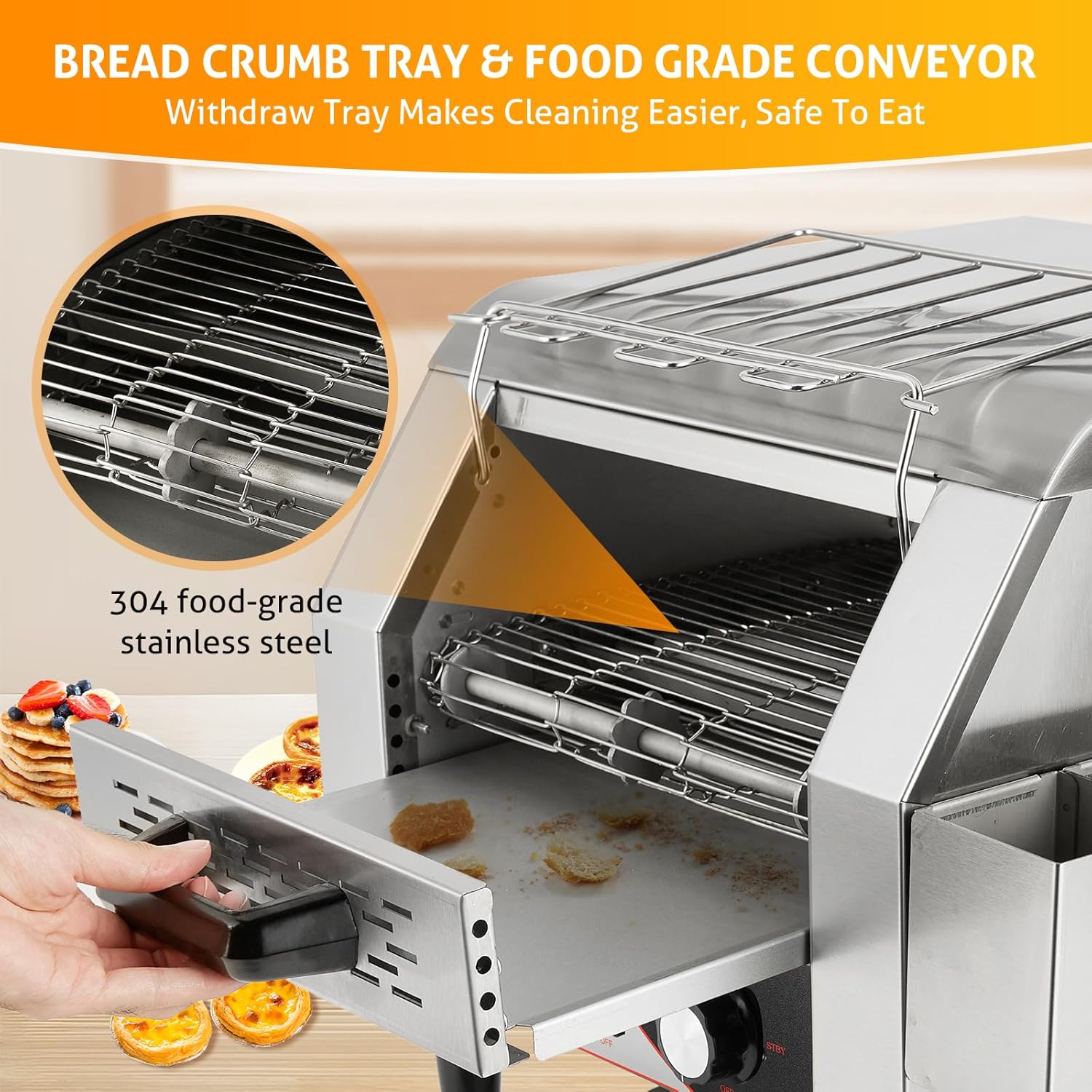 Hand pulling out the removable crumb tray from the WICHEMI Commercial Conveyor Toaster, showing accumulated crumbs.