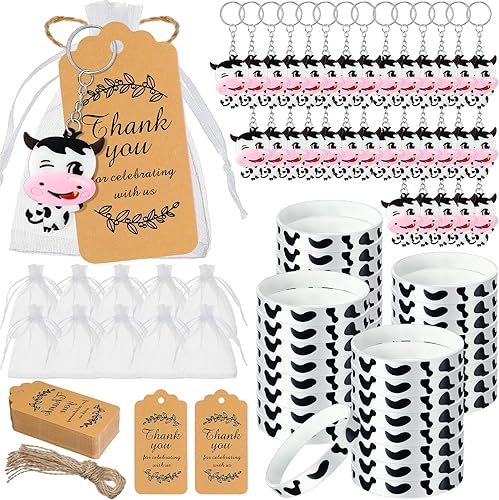Sasylvia 144 piezas de recuerdos de fiesta de vaca incluyen 36 juegos de llaveros de vaca con etiquetas de papel kraft de agradecimiento, pulseras