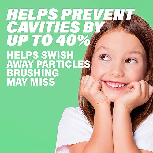 Miniatura 13 de ACT Kids - Enjuague bucal anticaries con flúor, sabor sandía (Wild Watermelon), tapa dosificadora precisa, sin alcohol, versión original, 16.9 fl oz