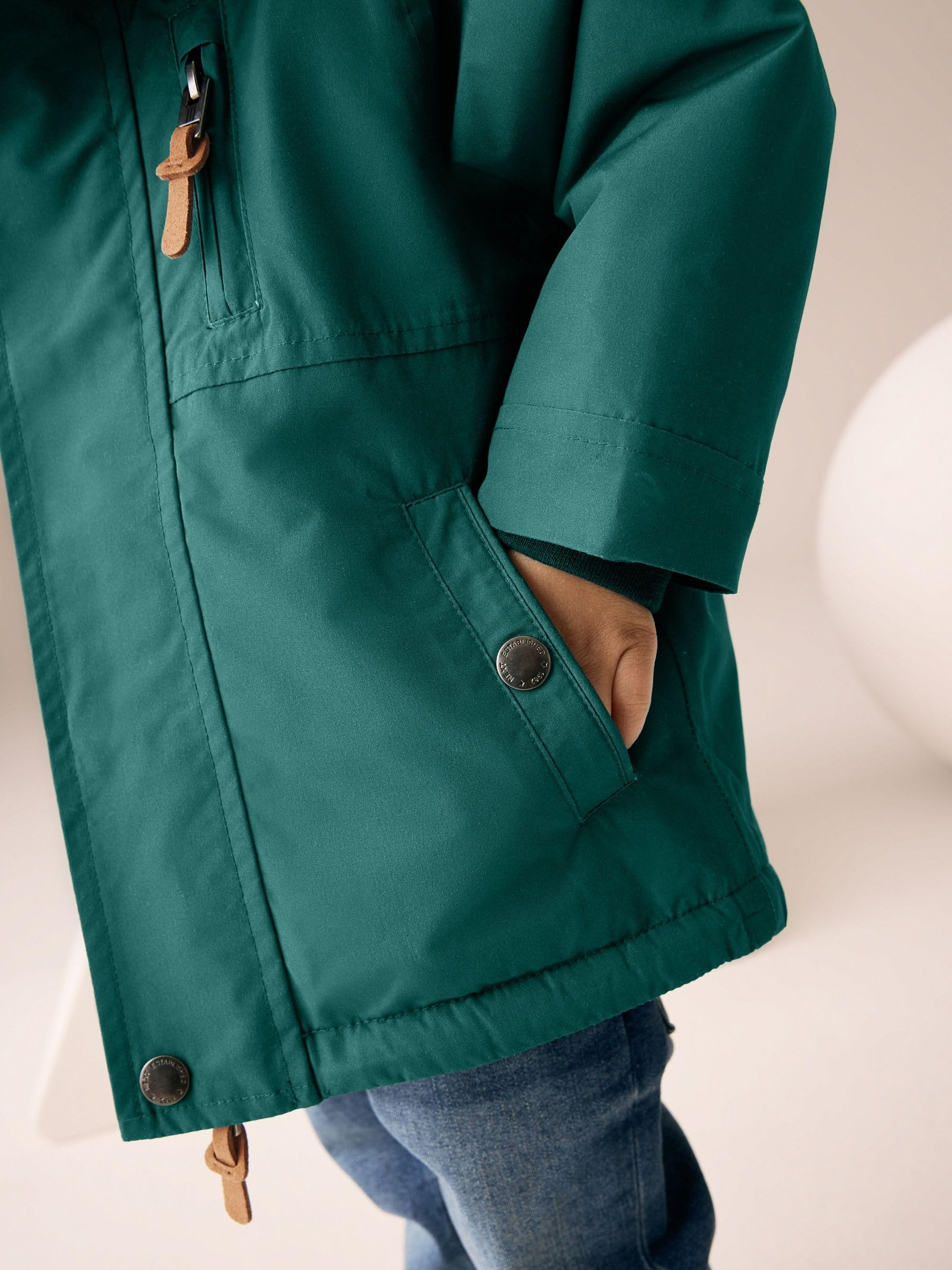 NEXT Garçon Parka imperméable avec doublure en peau lainée
