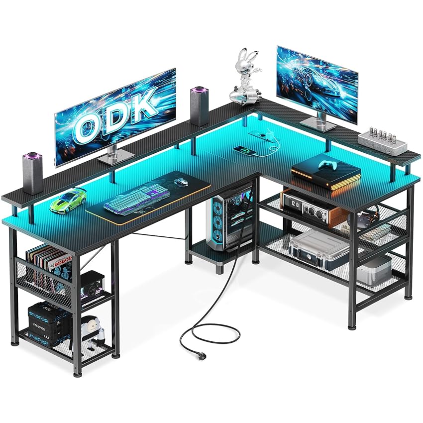 ODK Scrivania Gaming con LED, Scrivania Angolare Reversibile con 2 Prese e 2 Porte USB, Grande Scrivania Gaming Angolare con Ripiano in Rete, Nero Fibra di Carbonio, 150×102 cm